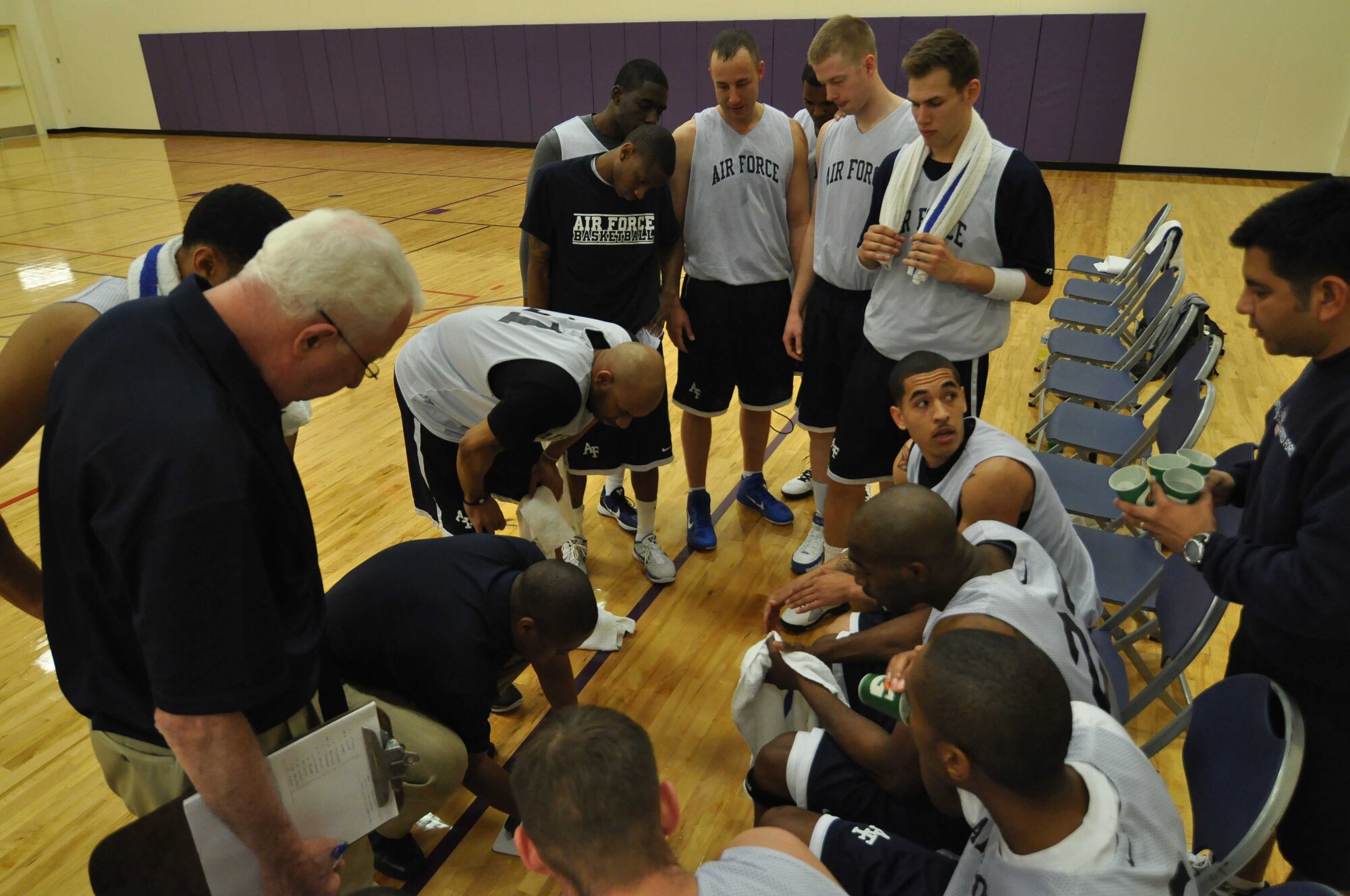 The Air Force basketball team (white) scrimmages the American Basketball Associations Minnesota Blizzards (blue) at the Minneapolis-St. Paul International Airport Air Reserve Station, Minn., April 2 2011. (Air Force Photo/TSgt Bob Sommer)