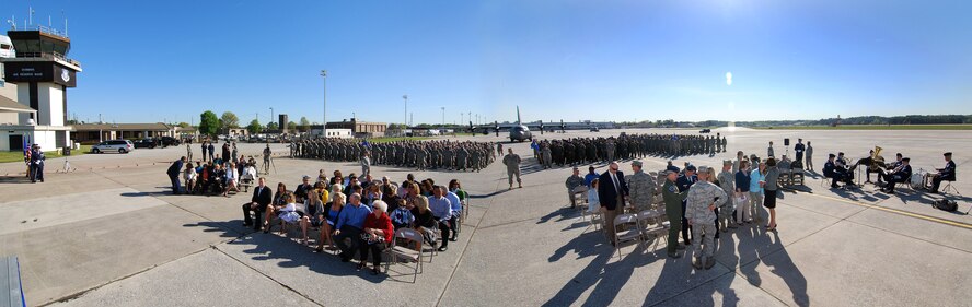 A photo illustration combining two photographs of the venue for the 94th Airlift Wing Command Chief, Chief Master Sgt. John M. Anderson's retirement ceremony at Dobbins Air Reserve Base, Ga. Apr 3.  (U.S. Air Force photo/ Brad Fallin)