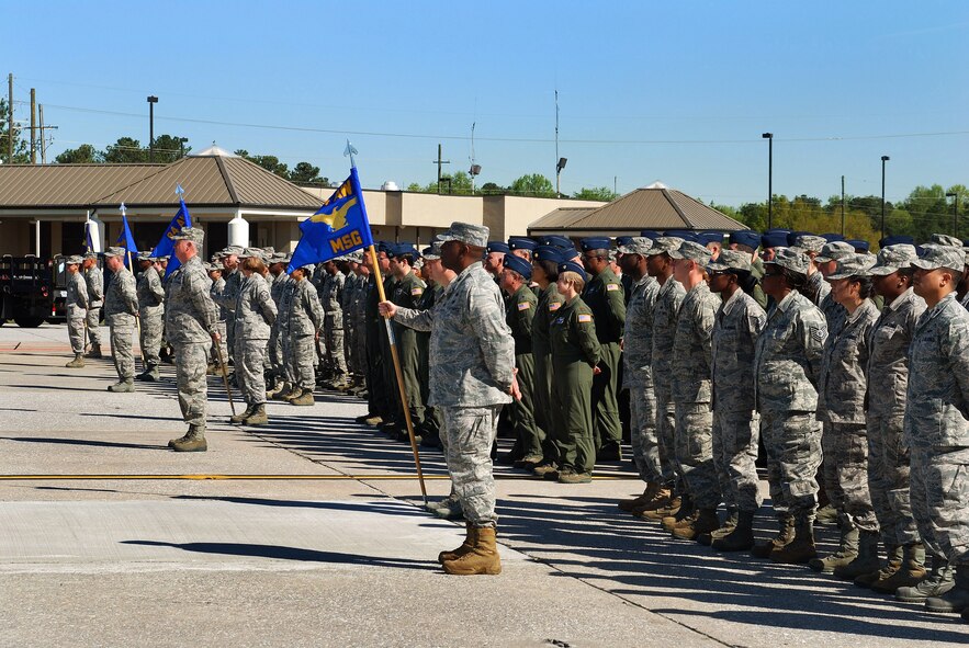 Men and women of the 94th Airlift Wing stand in formation to honor Chief Master Sgt. John M. Anderson, 94th Airlift Wing Command Chief, on the day of his retirement, Apr 3.  Chief Anderson retires after 33 years of active and reserve Air Force duty.   (U.S. Air Force photo/ Brad Fallin)