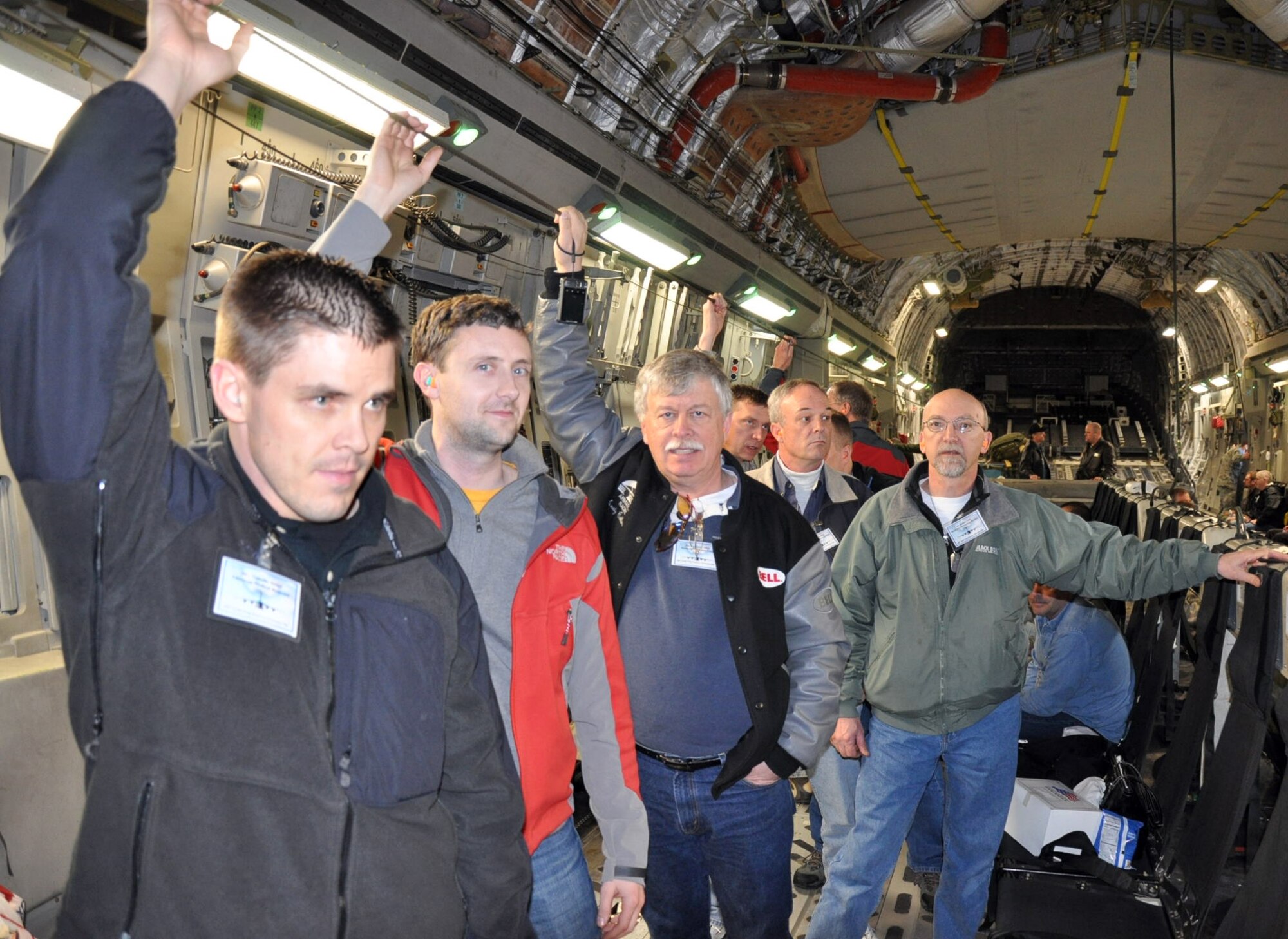 Civilian employers lined up for a chance to climb into the flight deck aboard a C-17 Globemaster III during Employer Orientation Day at McChord Field, Wash., April 2.  The  446th Airlift Wing hosted civilian employers from throughout the Northwest during the bi-annual event, which gives employers the opportunity to learn how Reservists train and fight. (U.S. Air Force photo by Staff Sgt. Elizabeth Moody)