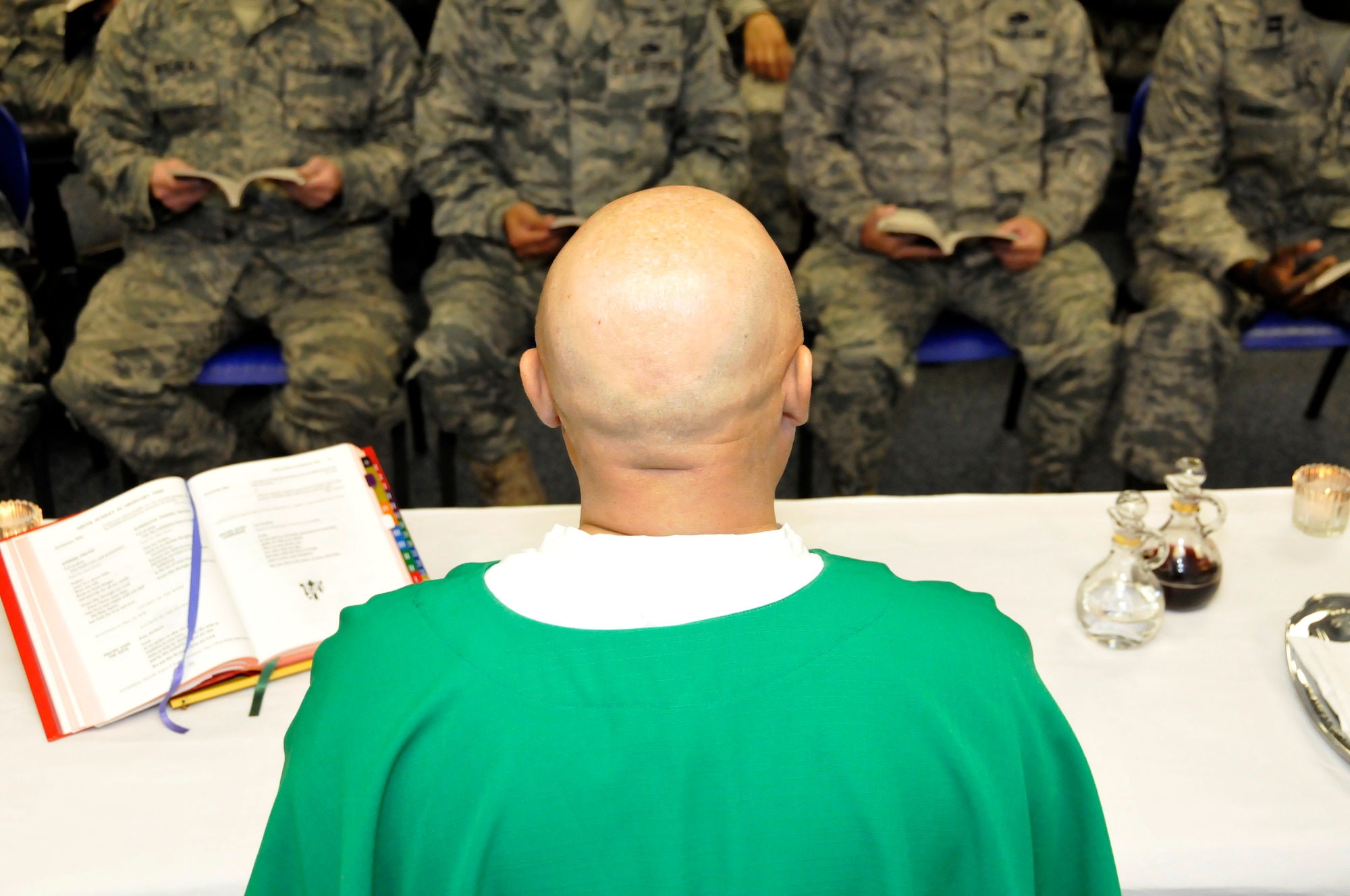 Chaplain (Maj.) Mike Martinez conducts Catholic mass for Arizona Air National Guardsmen assigned to Tucson’s 162nd Fighter Wing during a Unit Training Assembly weekend. (U.S. Air Force photo/Tech. Sgt. Hollie Hansen)
