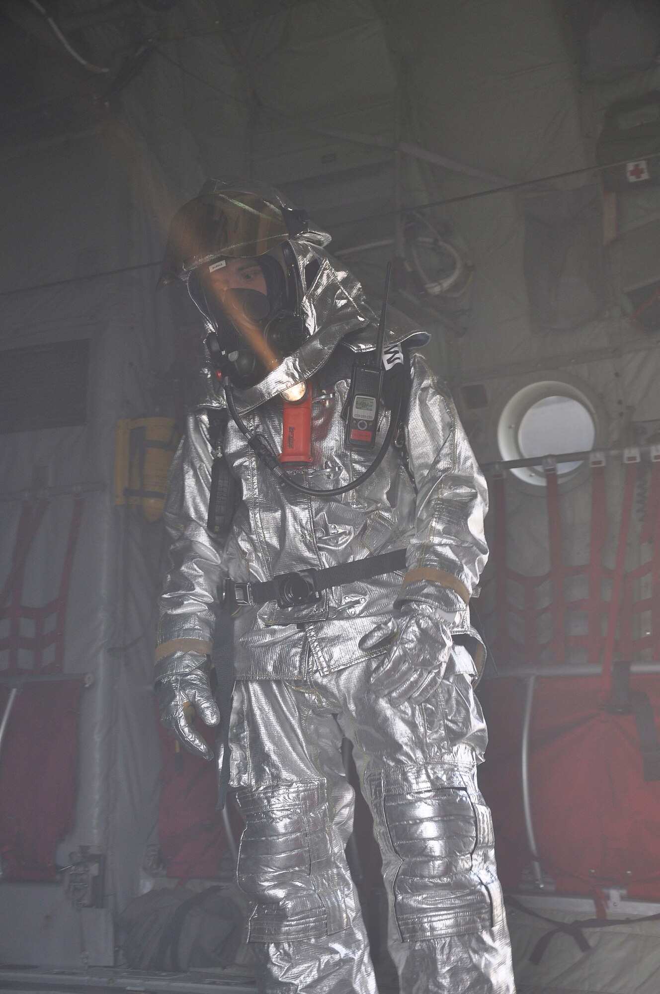 A firefighter from the 934th Airlift Wing, responds during a simulated C-130 Hercules fire April 3 2011. (Air Force Photo/TSgt Bob Sommer)