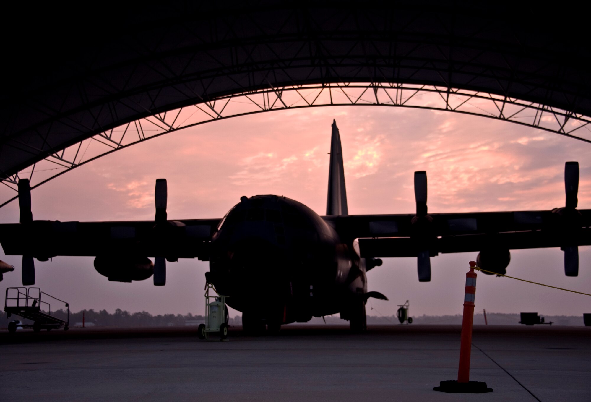 Day breaks on behind a 919th Special Operations Wing MC-130E Combat Talon April 2 at Duke Field.  The wing provides and maintains the Combat Talon special operations aircraft designed for covert operations. (U.S. Air Force photo/Tech. Sgt. Samuel King Jr.)