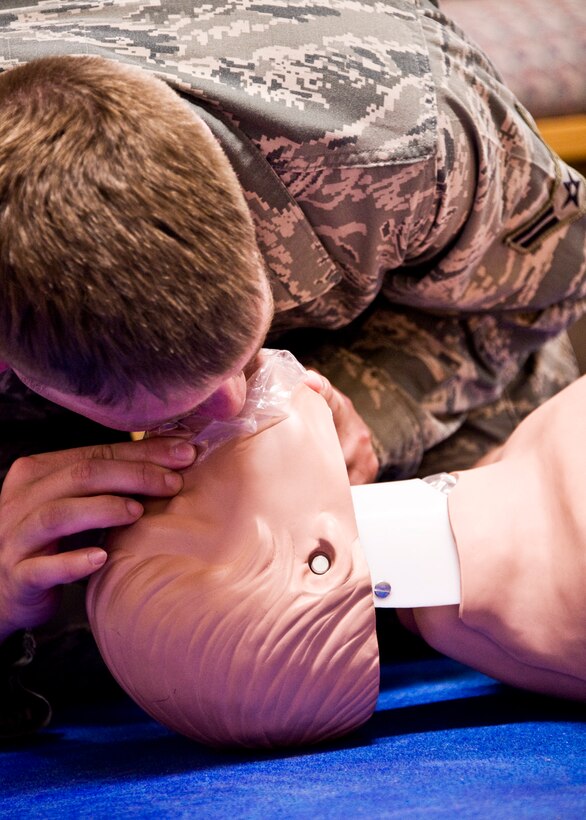 Airman 1st Class Bryan Mixson, 919th Aircraft Maintenance Squadron, practices CPR techniques during the 919th Special Operations Wing’s first four-day training weekend.  Training classes, such as gas mask, self-aid and buddy care and law of armed conflict were offered April 1 to ensure Airmen were able to accomplish as much training as possible.  (U.S. Air Force photo/Tech. Sgt. Samuel King Jr.)