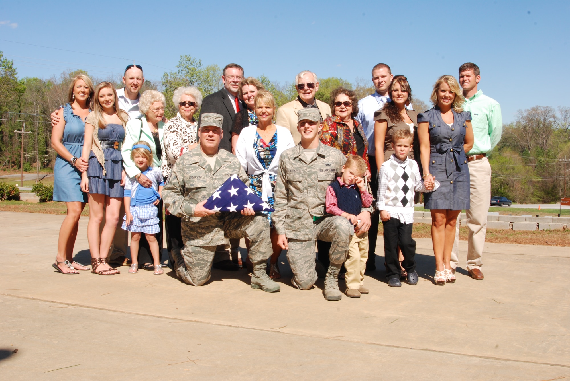 Friends and family of Chief Master Sgt. John Anderson, 94th Airlift Wing Command Chief, witnessed the American Flag folding ceremony commemorating 33 years of service to the Air Force during the April unit training assembly.  (U.S. Air Force photo/Master Sgt. Stan Coleman)