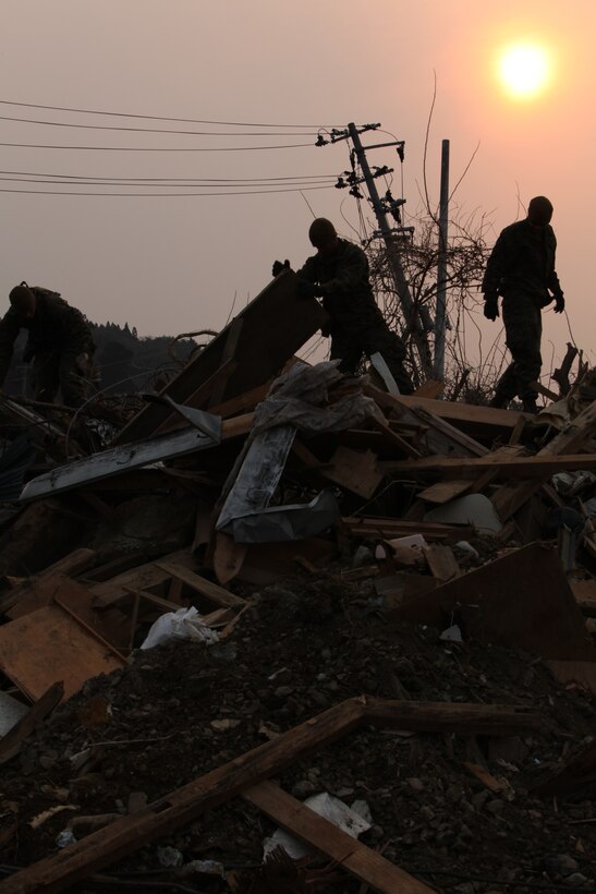 Marines with Battalion Landing Team 2nd Battalion, 5th Marines, 31st Marine Expeditionary Unit, pick-up debris during a humanitarian assistance/disaster relief mission at Uranohama Port, April 2. The mission was in support of Operation Tomodachi.  The 31st MEU's involvement is part of a larger U.S. government response, after a 9.0 earthquake and subsequent tsunami struck Japan causing widespread damage.  The 31st MEU is ready to support our Japanese partners and to provide assistance when called upon.