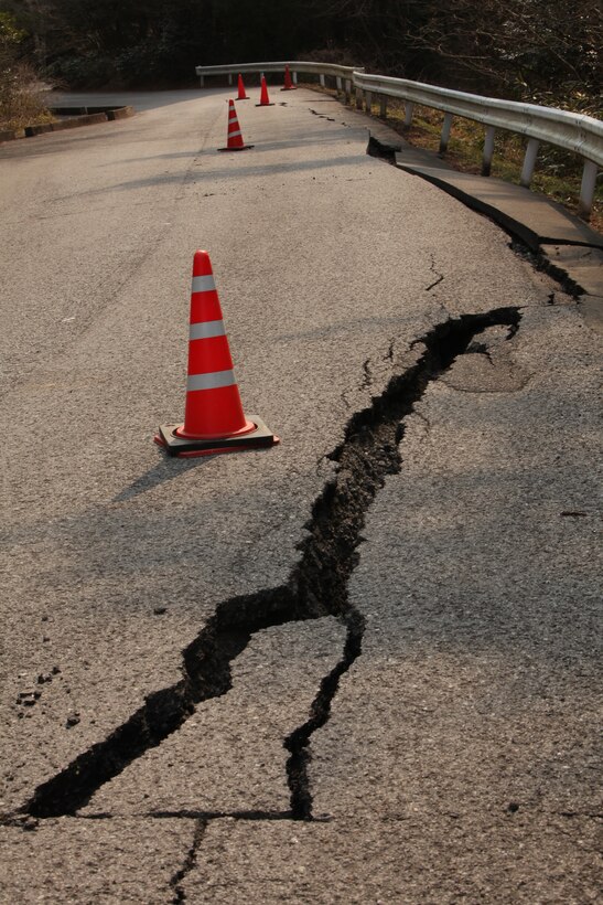 A crack along the road is marked by orange cones at Uranohama Port in the aftermath of the earthquake and subsequent tsunami that struck the region.  The 31st MEU's involvement in Operation Tomodachi is part of a larger U.S. government response, after a 9.0 earthquake and subsequent tsunami struck Japan causing widespread damage.  The 31st MEU is ready to support our Japanese partners and to provide assistance when called upon.