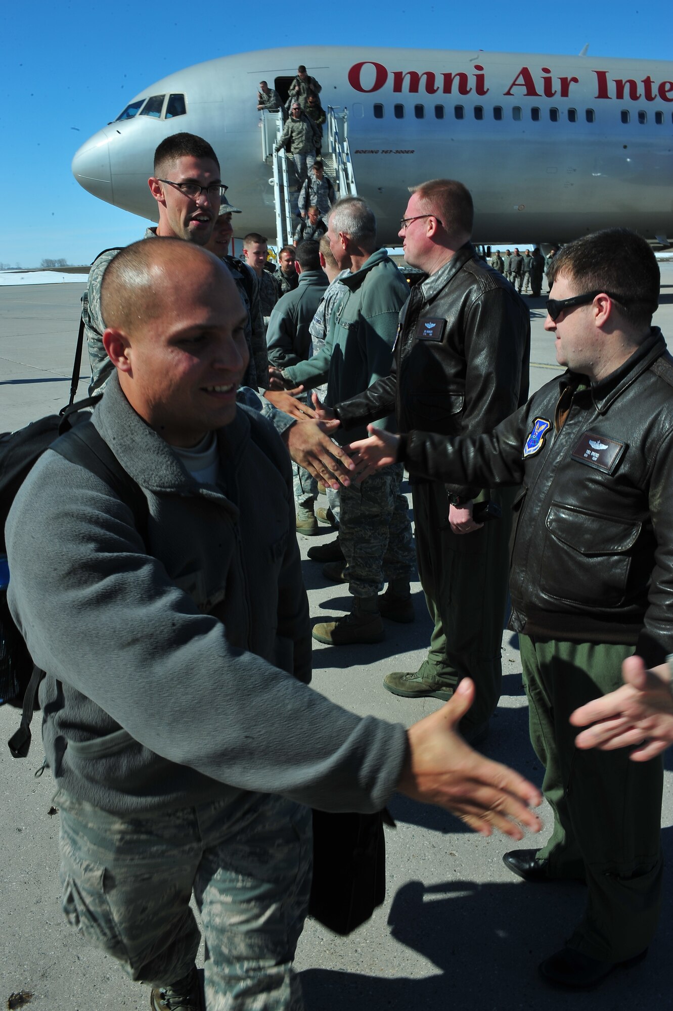 MINOT AIR FORCE BASE, N.D. – More than 200 members of the 5th Bomb Wing return home here on April 4 from a six month deployment to Andersen AFB, Guam. Minot’s 69th Bomb Squadron and 5th BW deployed to Andersen AFB, Guam last November in support of U.S. Pacific Command’s Continuous Bomber Presence. This was the 69th BS’ first deployment since it’s reactivation in September 2009 and the first major combat deployment of aircraft and personnel since World War II. (U.S. Air force photo/ Senior Airman Jesse Lopez)