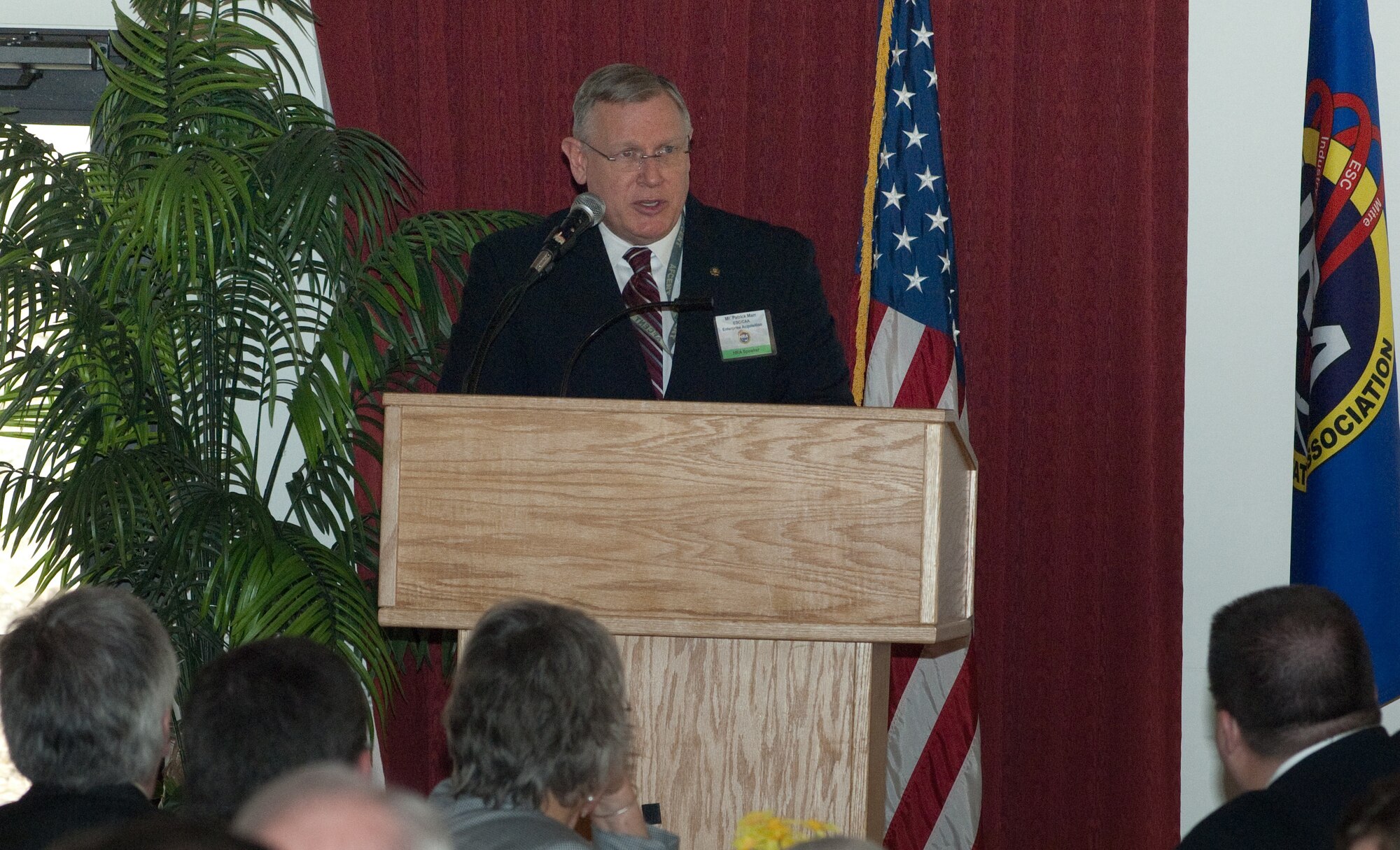 Patrick Marr, director of Electronic Systems Center’s Enterprise Acquisition Division, briefs industry reps on the anticipated procedures and timelines for the center’s next round of support contracting efforts at Hanscom AFB March 31.  (USAF Photo by Rick Berry)