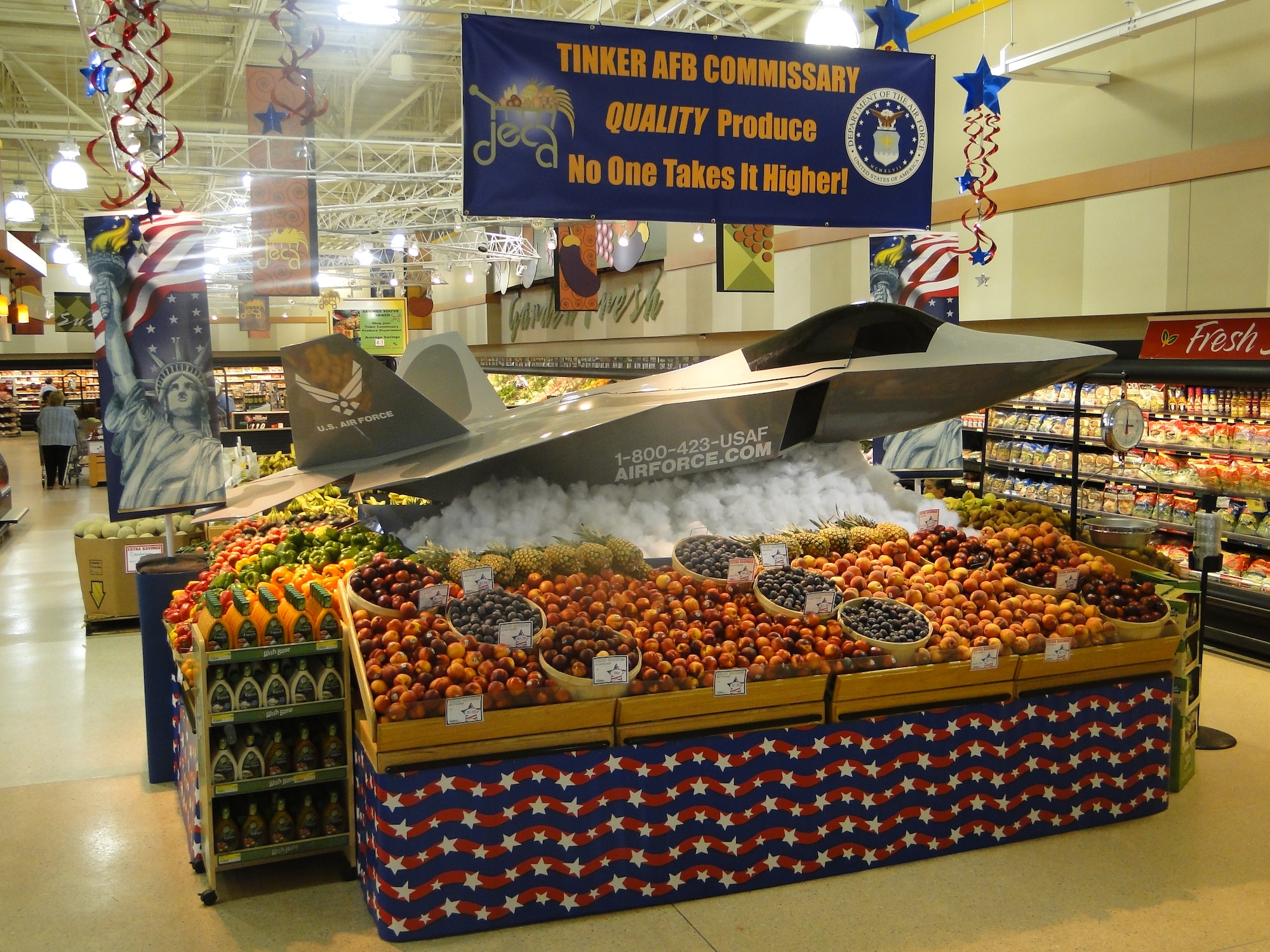 This F-22 Raptor advanced tactical fighter model, which is actually a go-cart, takes produce sky high at the commissary at Tinker Air Force Base, Okla. Tinker commissary managers won their second straight “best large U.S. store” award. Ten commissaries worldwide earned honors in 2010 during the 10th Annual Produce Merchandising Contest. The annual competition highlights the Defense Commissary Agency’s role as nutritional leader for the Department of Defense.  Winning stores excelled in quality and team performance in areas such as creative displays, customer education events and increased produce sales. (DeCA photo/Dennis Messner)