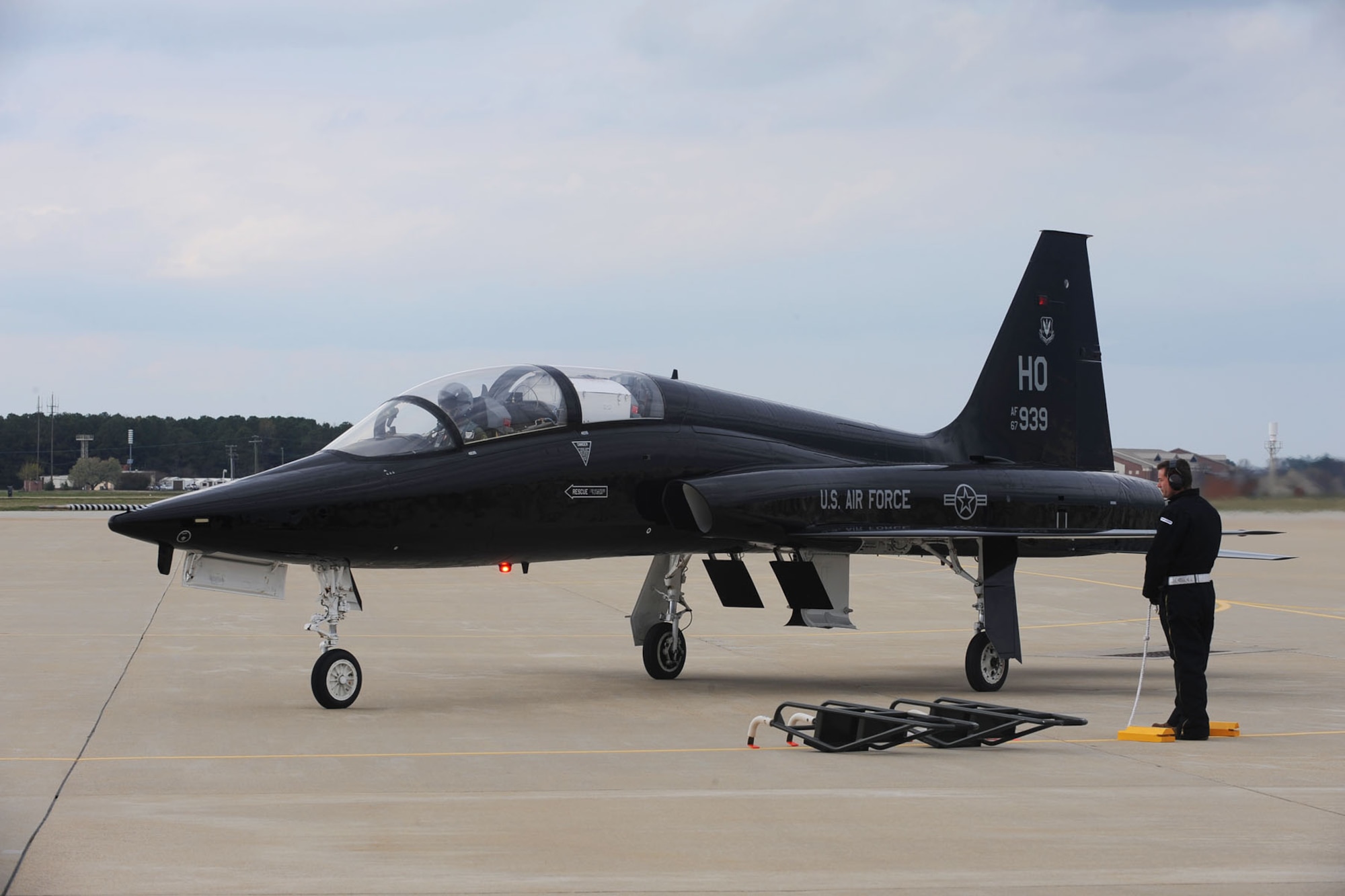 Col. Kevin Mastin, 1st Fighter Wing vice commander arrives at Langley AFB, Va., April 1, 2011 in a T-38 Talon. The T-38, from Holloman AFB, N.M., is on a temporary duty assignment to support the F-22 Raptors and provide hands-on combat readiness training for 1st FW pilots. (U.S. Air Force photo by Staff Sgt. Ashley Hawkins/Released)