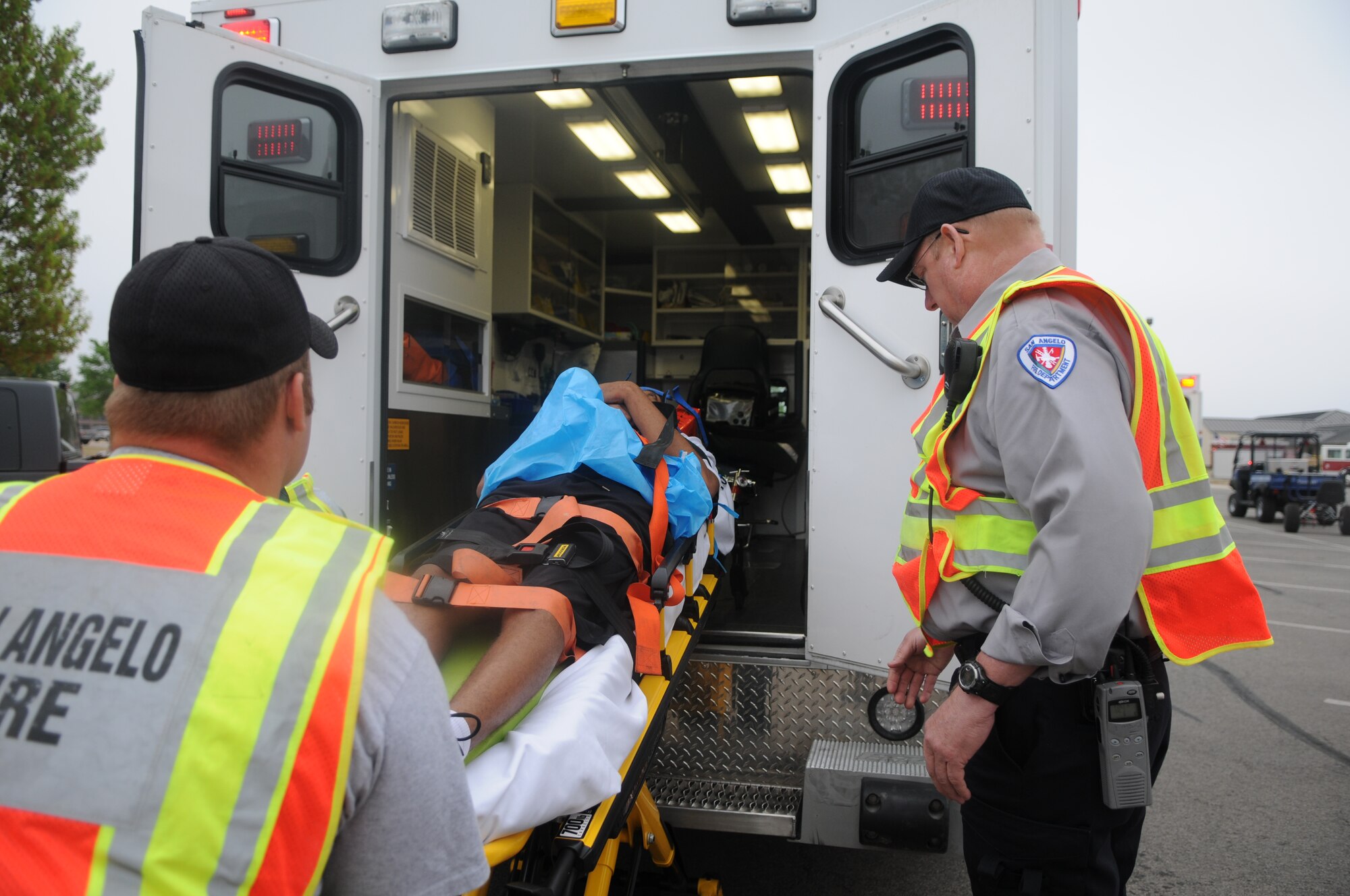 GOODFELLOW AIR FORCE BASE, Texas-- Members of the San Angelo Fire Department transport injured base personnel to off-base medical facilities during a base-wide active shooter exercise, March 26.  The base coordinated with the San Angelo community to ensure base personnel received proper service and treatment during the two-day event. (U.S. Air Force photo/Staff Sgt. Heather Rodgers)