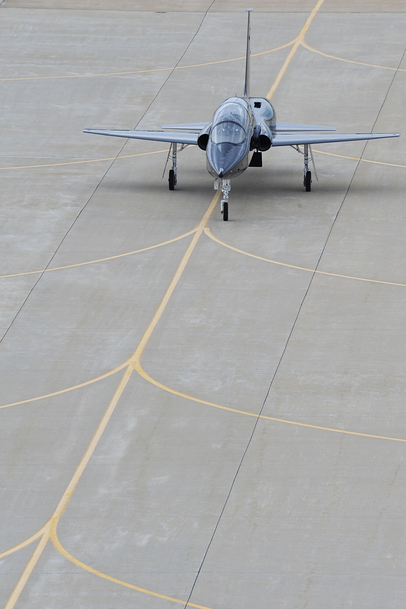 A T-38 Talon arrives at Langley AFB, Va., April 1, 2011  from Holloman Air Force Base, N.M.. The aircraft, flown by Col. Kevin Mastin, 1st Fighter Wing vice commander, is temporarily assigned to the 1st Fighter Wing to support combat readiness training for the pilots. (U.S. Air Force photo by Senior Airman Brian Ybarbo/Released)
