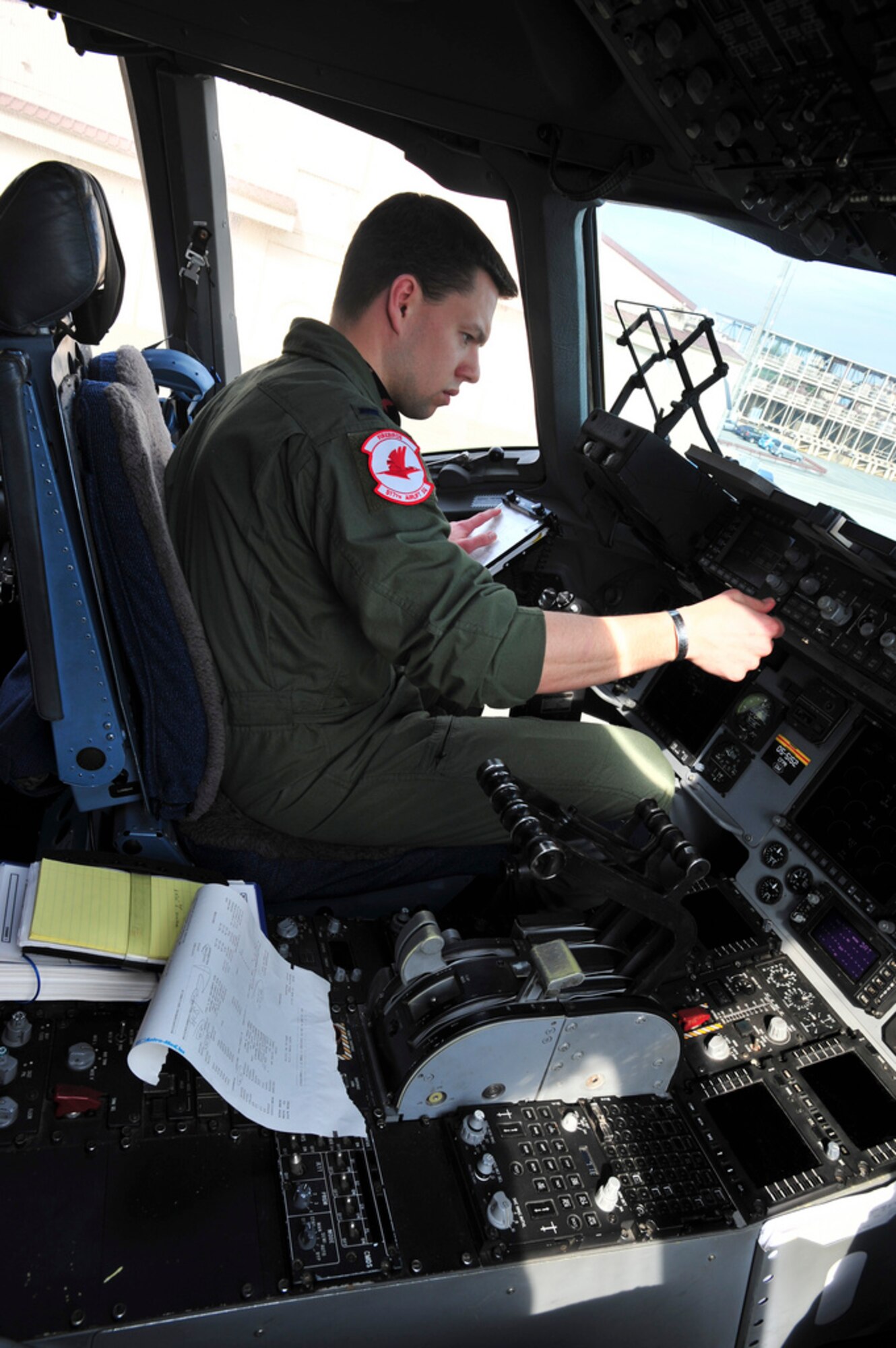 YOKOTA AIR BASE, Japan -- 1st Leuitenant JohnRoss Wendler, a pilot with the 517th Airlift Squadron, preflights a C-17 Globemaster III prior to a mission here, April 1. Wendler and fellow members of the 517th from Joint Base Elmendorf-Richardson, Alaska are providing support to Operation Tomodachi by shuttling supplies to and from other bases around Japan. (U.S. Air Force Photo/ Staff Sgt. Joshua Garcia)