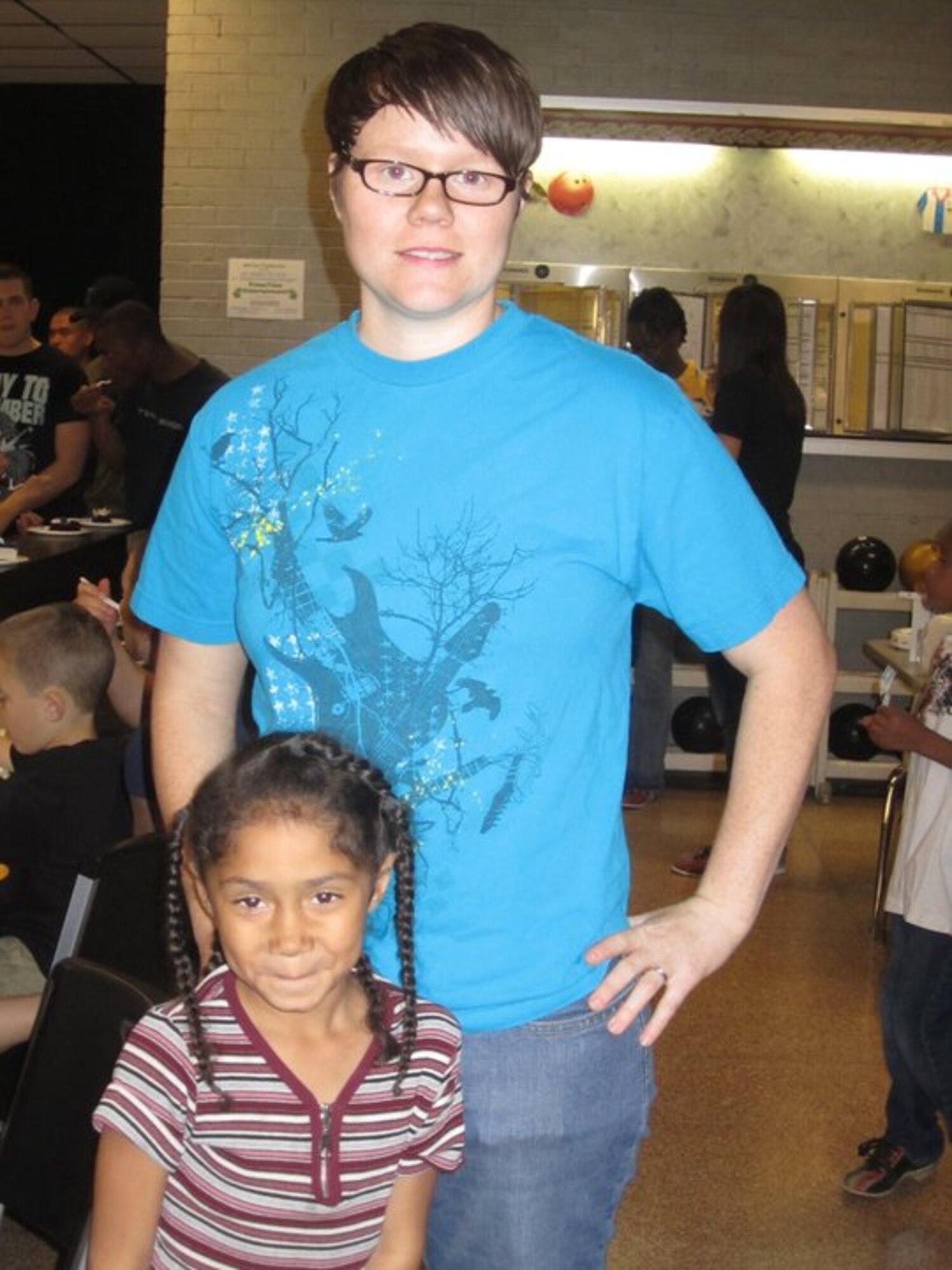 The Dyess 56 Club hosted a Big for a Day event March 12 at the bowling alley here for Abilene children who are waiting for a Big Brother or Sister.