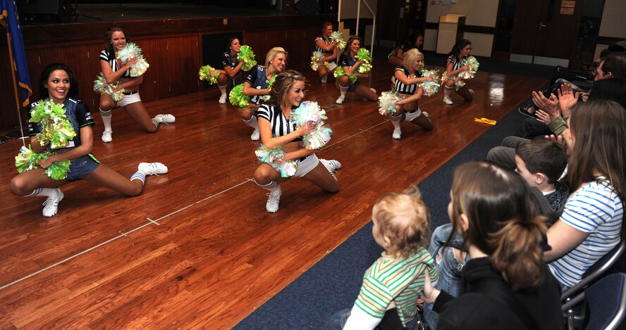 RAF CROUGHTON, United Kingdom - The Seattle Sea Gals, an NFL cheerleading team for the Seahawks, performed a variety show for servicemembers and their families at the Community Center here April 2 as part of an Armed Forces Entertainment tour across England.. The Sea Gals also conducted a cheerleading clinic earlier in the day. (U.S. Air Force photo by Tech. Sgt. John Barton)