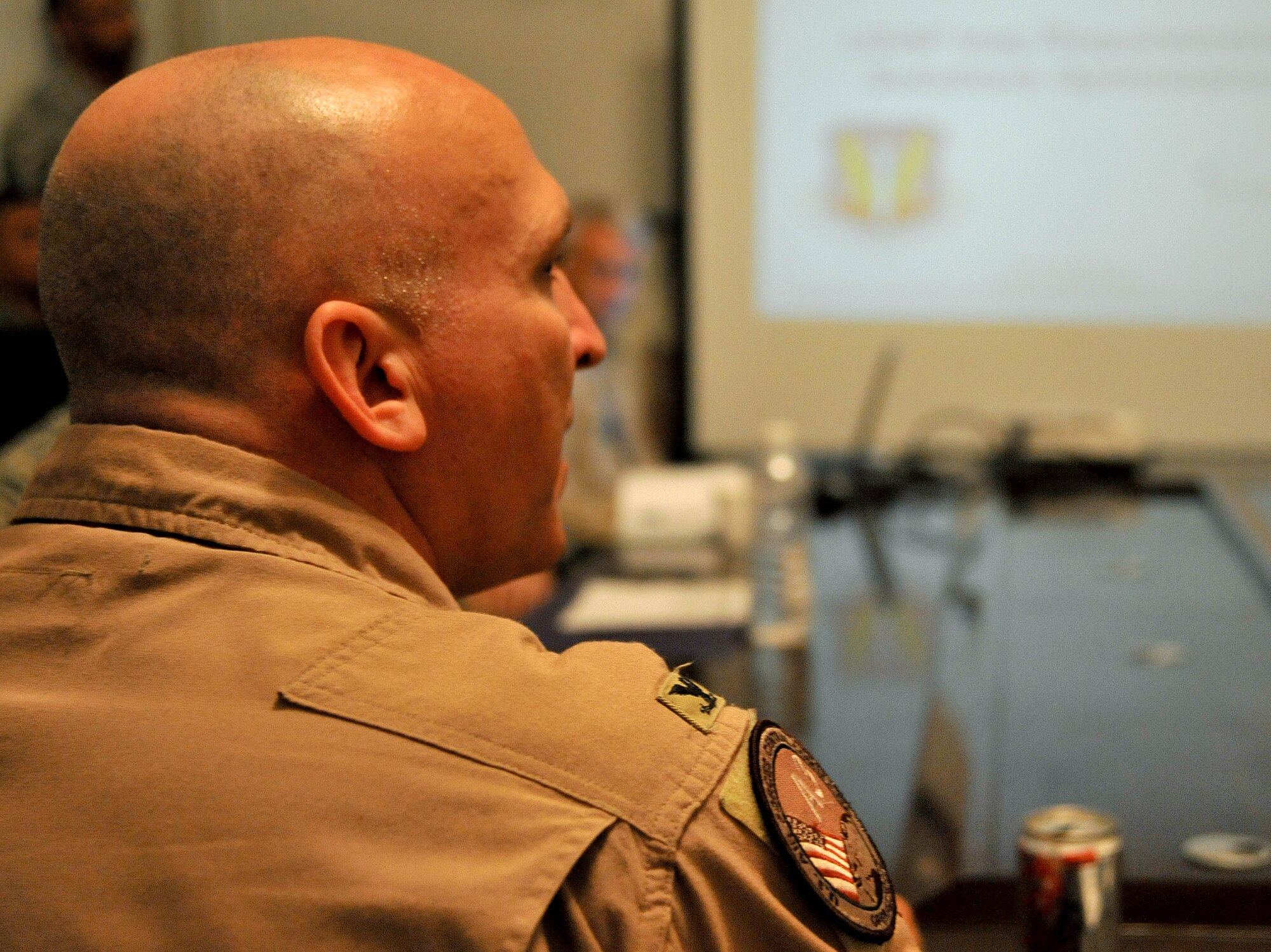 U.S. Air Force Col. Jeffrey Kelly, U.S. Air Forces Central, Shaw Air Force Base,  S.C., speaks to 45 leaders from the U.S. and bases in Iraq and Southwest Asia, March 22, 2011, Victory Base Complex, Iraq.  This was the first of quarterly meetings to talk face-to-face. The roomful of leaders included 17 U.S. Army commanders who were able to identify their mission needs directly to the people who make the deployment decisions affecting Airmen.  (U.S. Air Force photo by Senior Airman Andrew Lee/Released)