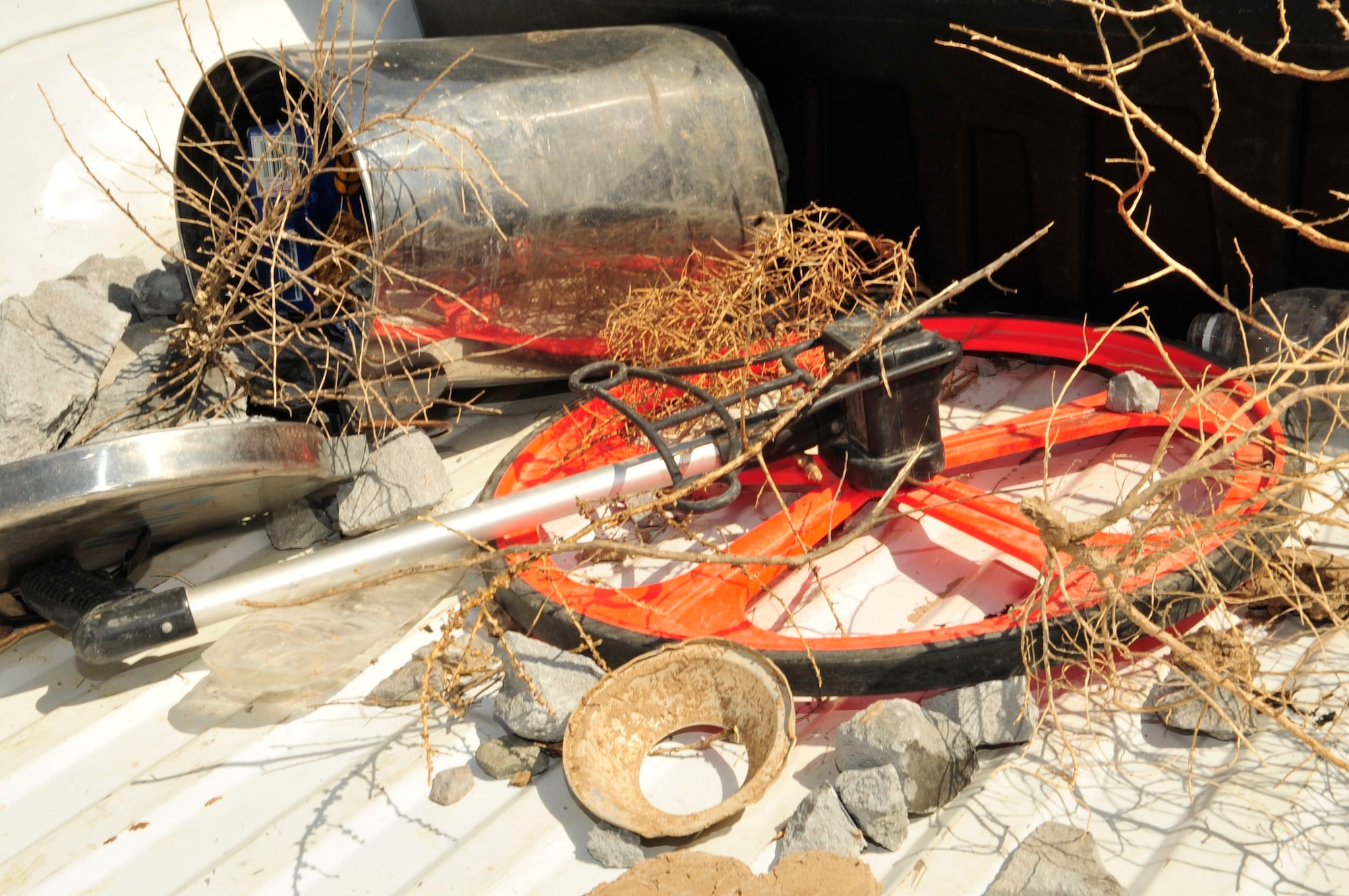 Foreign object debris found on the flight line fills the truck bed of an airfield management vehicle parked on Sather Air Base, Iraq, March 31, 2011. FOD can cause damage to aircraft if not picked up and removed from the airfield. (U.S. Air Force photo by Senior Master Sgt. Larry Schneck/Released)