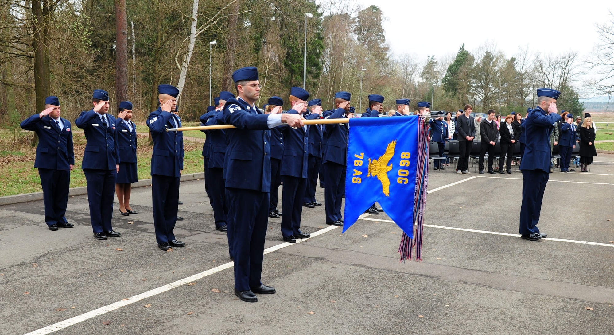 U.S. Air Force members from the 76th Airlift Squadron render a salute during a memorial ceremony, Ramstein Air Base, April 1, 2011. The squadron honored the six crew members of flight IFO-21, a CT-43 aircraft that was assigned to the 76th AS and crashed outside of Dubrovnik Croatia on April 3, 1996 during a peacekeeping mission. This year marked the 15th anniversary. (U.S. Air Force photo by Senior Airman Brittany Perry)