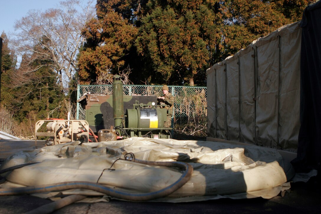 A water heating system operated by Marines with the 31st Marine Expeditionary Unit, provided showers to over 300 displaced locals using a school as shelter, April 3-6. As part of Operation Tomodachi, the 31st MEU is ready to support our Japanese partners and to provide assistance when called upon.