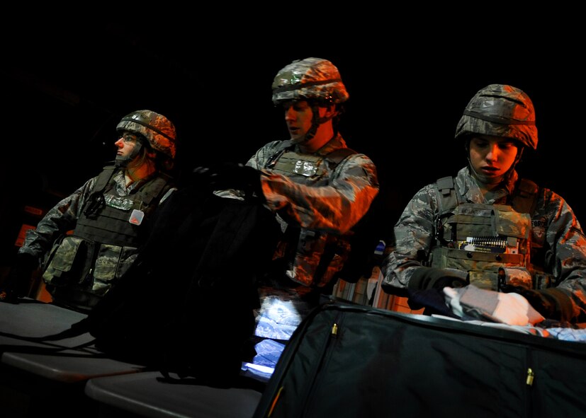 51st Security Forces Squadron members at Osan Air Base, Republic of Korea are practicing increased security measures during the 2011 Korea Pacific Air Forces Command Operational Readiness Inspection.  An ORI is conducted to evaluate and measure the ability of units with a wartime, contingency orforce sustainment mission to perform operations plan and assigned tasks.  Inspectable areas include initial response, employment, mission support and Ability-to-Survive and Operate in a chemical environment.  (U.S. Air Force Photo by Senior Airman Evelyn Chavez)