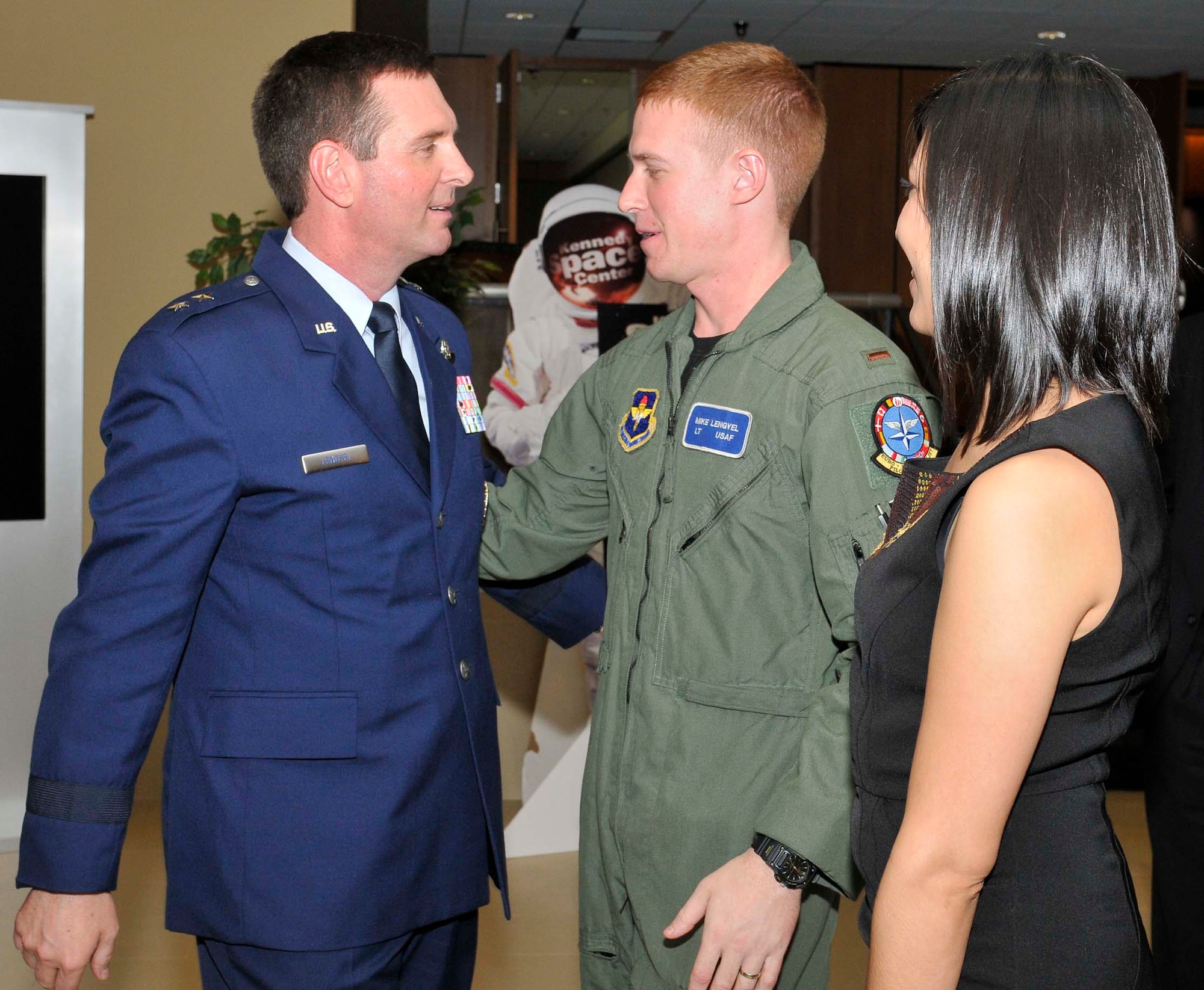 Maj. Gen. Joseph Lengyel talks with his son 2nd Lt. Michael Lengyel after his promotion ceremony at Tyndall Air Force Base, Fla., April 1. General Lengyel is the 1st Air Force (Air Forces Northern) vice commander. (U.S. Air Force photo by Lisa Norman)