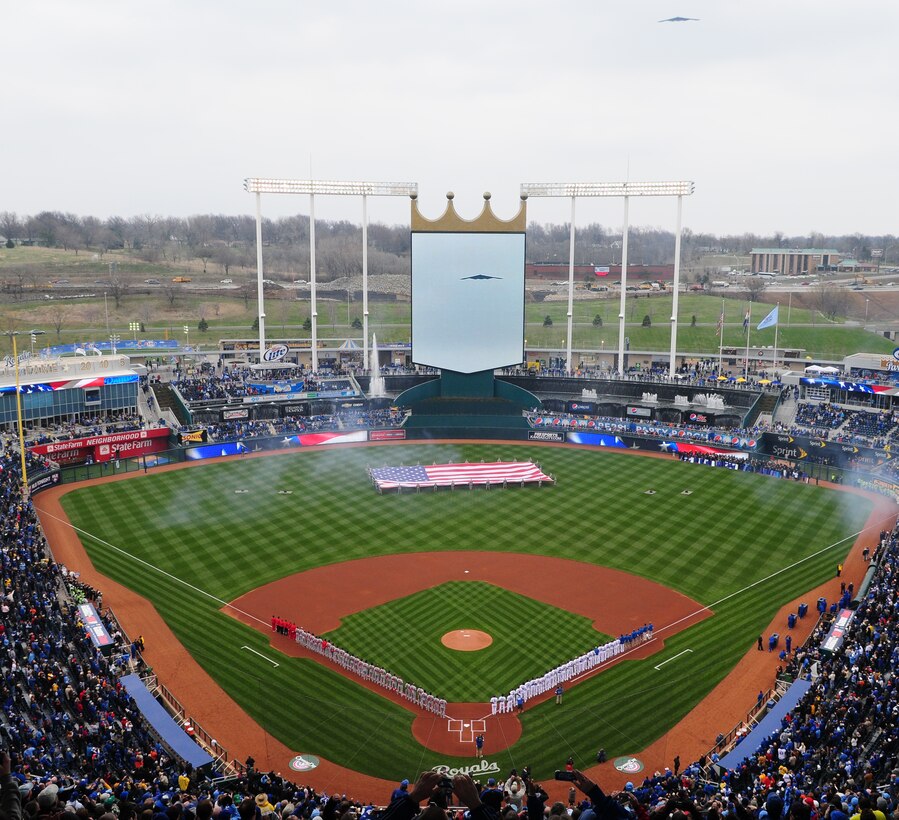 An Air Force Global Strike Command B-2 Spirit stealth bomber crew from Whiteman Air Force Base, Mo., performs a B-2 flyover at the season opener for the Kansas City Royals March 31 in Kansas City. B-2s recently returned to Whiteman after striking targets in Libya in support of Operation Odyssey Dawn. (Courtesy photo/Kansas City Royals)