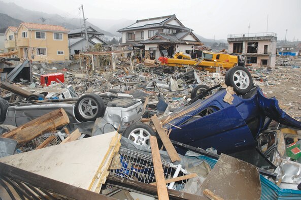 Four days later:  In Otunato, Japan, boats and cars alike were tossed into buildings and buried in rubble during the March 11 earthquake and tsunami.  (U.S. Air Force photo/Technical Sgt. Daniel St. Pierre)