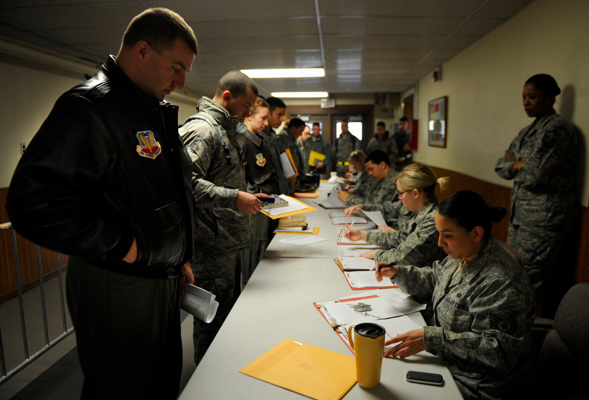 MOUNTAIN HOME AIR FORCE BASE, Idaho -- Members of the 389th Fighter Squadron process through a deployment line prior to their recent departure for Southwest Asia.  