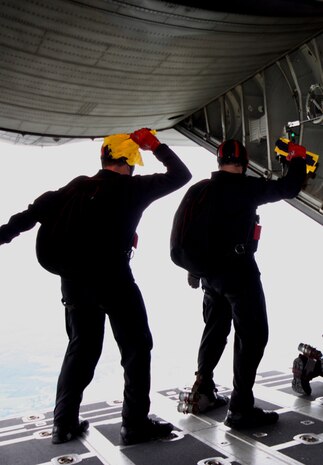 Members of the U.S. Army Special Operations Command Parachute Demonstration Team wait to jump as their aircraft approaches the jump site. (Photo courtesy/U.S. Army)