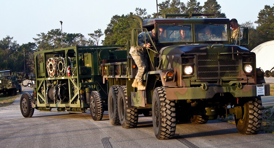 A truck, containing equipment to support the 728th Air Control Squadron training exercise, gets ready to leave for Duke Field. (U.S. Air Force photo/Lois Walsh)