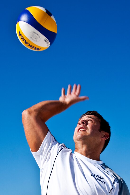 Tech. Sgt. David Dean, 919th Maintenance Squadron, goes up for a spike April 3 at Eglin’s Post’l Point.  Sergeant Dean, an Air Reserve Technician at Duke Field, was recently selected for the second year in a row for the Air Force men’s beach volleyball team.  His team placed second in the armed forces tournament last year.  A first or second place finish in the tournament this year (April 12-15) allows them to play in the World Military Games in Brazil.  (U.S. Air Force photo/Tech. Sgt. Samuel King Jr.)