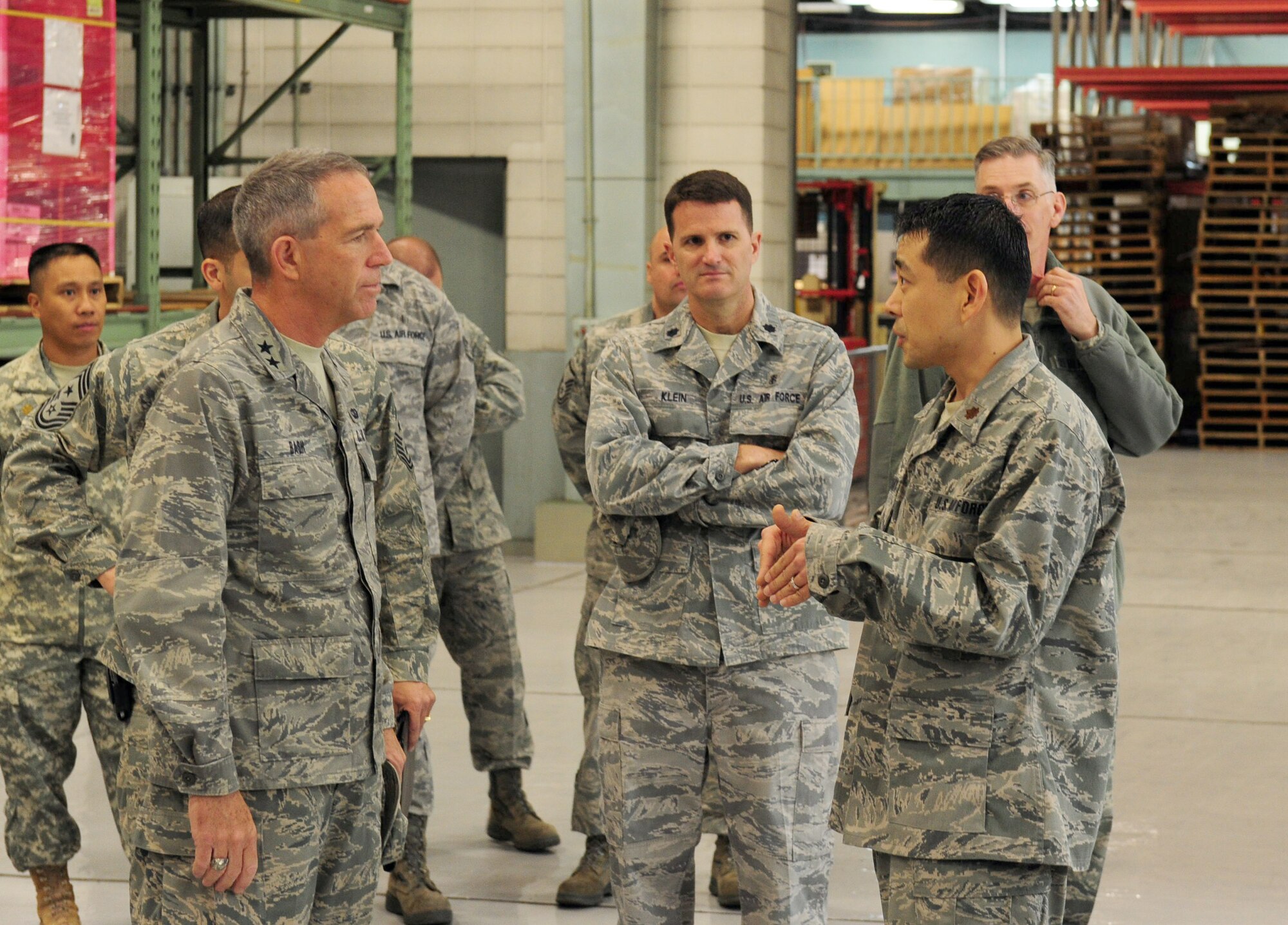 YOKOTA AIR BASE, Japan -- Maj. Michael Brown (right) briefs Maj. Gen. Brooks Bash during a tour of the medical logistics flight warehouse, Yokota Air Base, Japan, April 4, 2011. General Bash visited Yokota after the recent earthquake and tsunami that struck Japan.  General Bash is the vice commander of Pacific Air Forces and Maj. Brown is assigned to the 374th Medical Support Squadron as the medical logistics flight commander. (U.S. Air Force photo/Senior Airman Michael J. Veloz) 