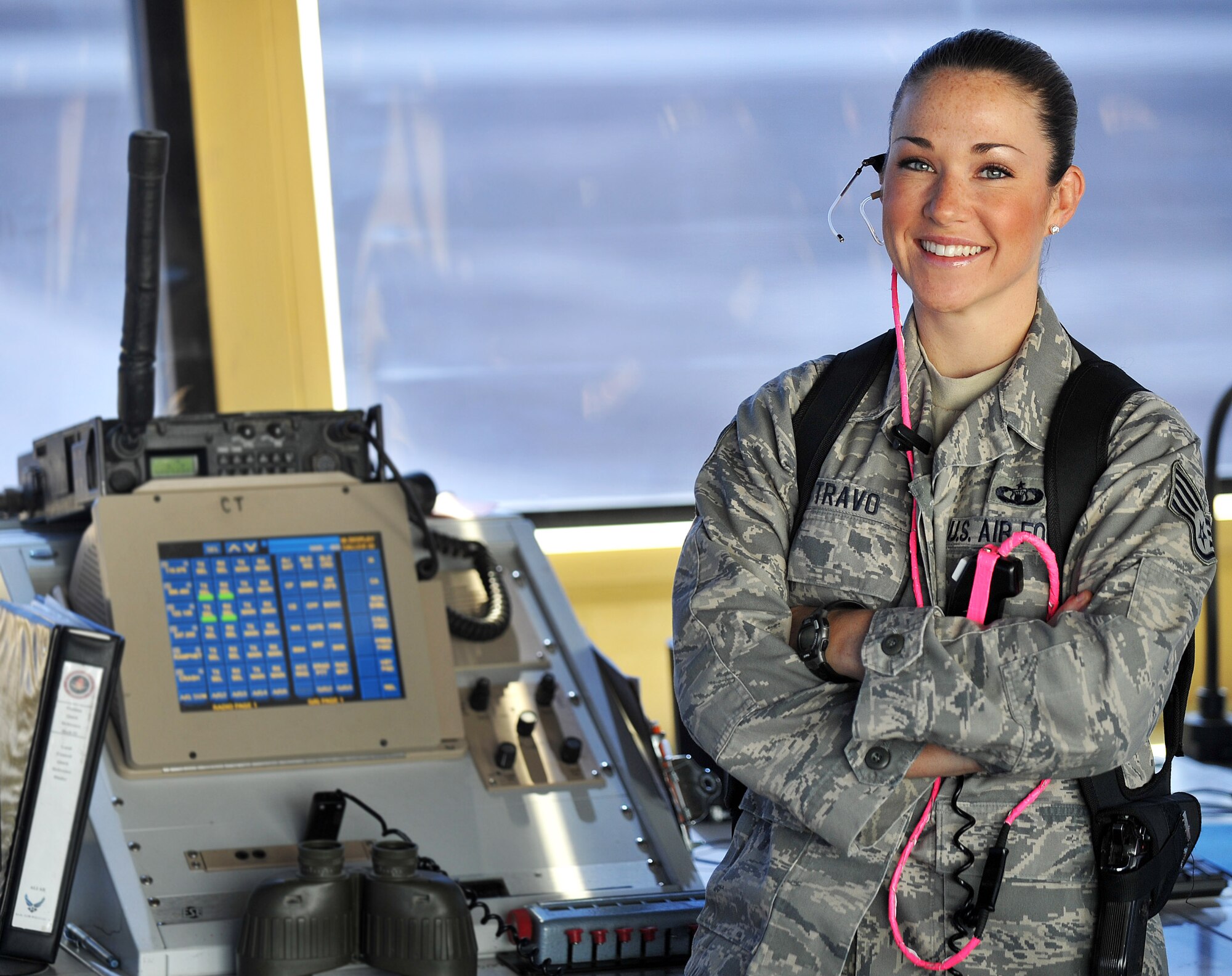 Staff Sgt. Kristen Travo, 407th Expeditionary Operations Support Squadron air traffic controller and Lompoc, Calif., native, poses for a photo inside the air traffic control tower March 5, 2011, on Ali Air Base, Iraq. Sergeant Travo is deployed from Hurlbert Field, Fla. (U.S. Air Force photo by Senior Airman Andrew Lee/Released) 