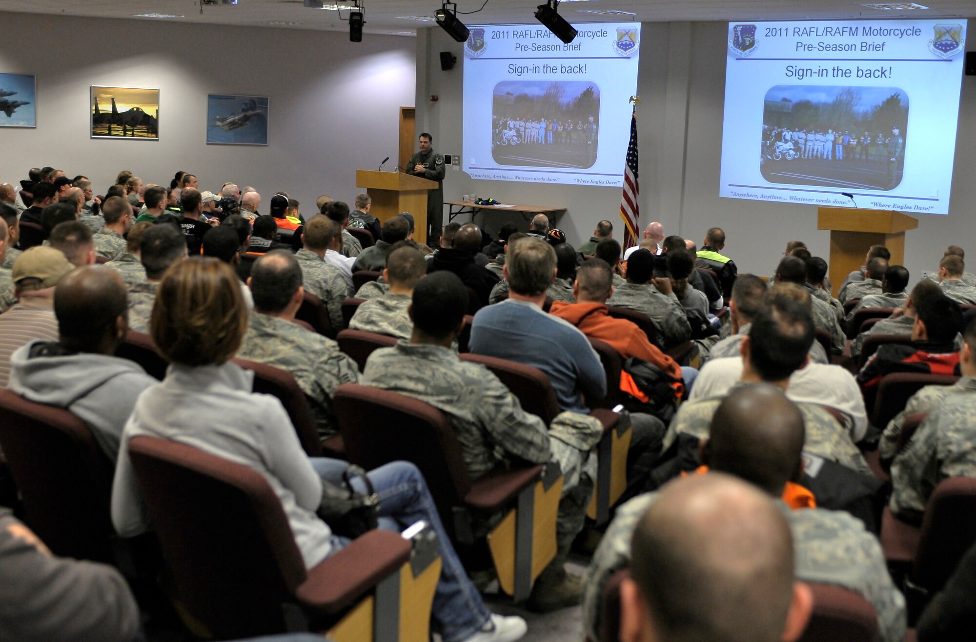 Lt. Col. Jeffrey Alexander, 48th Fighter Wing chief of Safety, gives the introduction during the pre-season motorcycle brief at the RAF Lakenheath Strike Eagle Complex on April 1, 2011.  More than 300 riders attended the briefing, which is mandatory for all U.S. motorcycle operators stationed in the U.K.  Safety issues and requirements for riders were discussed at the briefing.  Riders were reminded to be aware of conditions around them while riding including road conditions, wildlife, weather, and daylight hours.  The brief was followed by a ride through Stanton, Bury St. Edmunds and Newmarket, England.  (U.S. Air Force photo/Staff Sgt. Connor Estes)