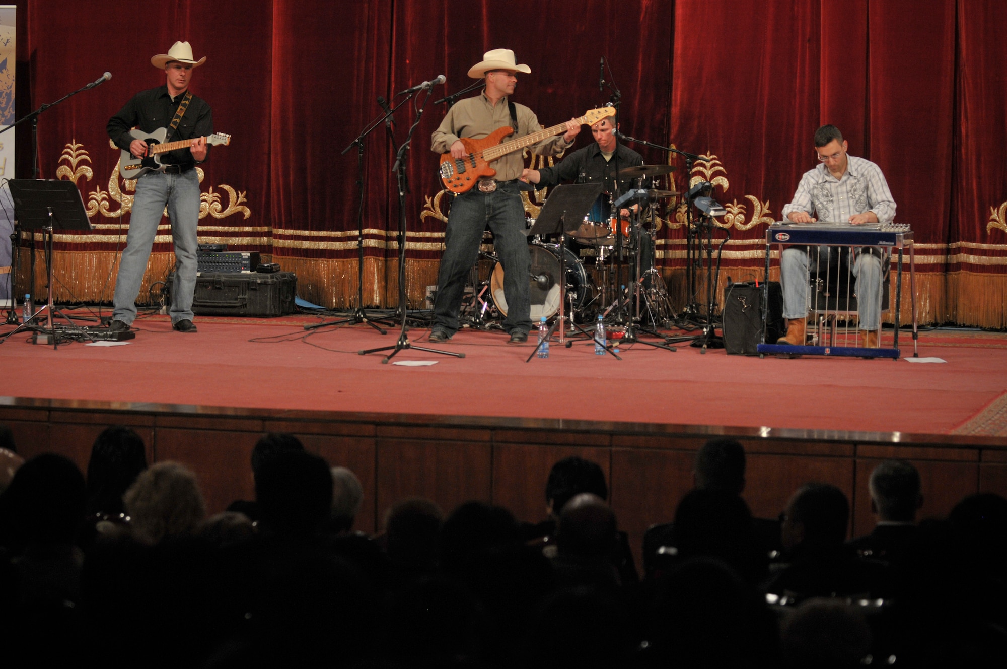TRANSIT CENTER AT MANAS, Kyrgyzstan -  AFCENT band "Wild Blue Country" performs for the local community at the National Philharmonic, here April 5.  The performance packed a full house of 1200 seats making that the largest performance any AFCENT band has ever played here. (U.S. Air Force photo/Staff Sgt. Stacy Moless)
