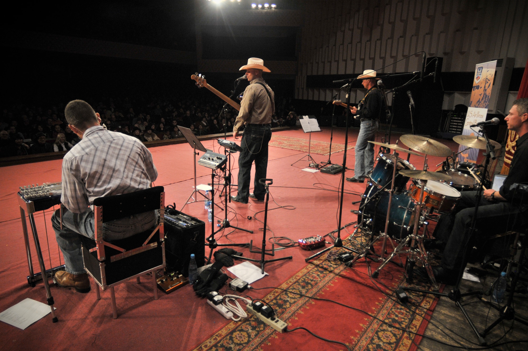 TRANSIT CENTER AT MANAS, Kyrgyzstan -  AFCENT band ? Wild Blue Country?  performs for the local community at the National Philharmonic, here April 5.  The performance packed a full house of 1200 seats making that the largest performance any AFCENT band has ever played here. (U.S. Air Force photo/Staff Sgt. Stacy Moless)
