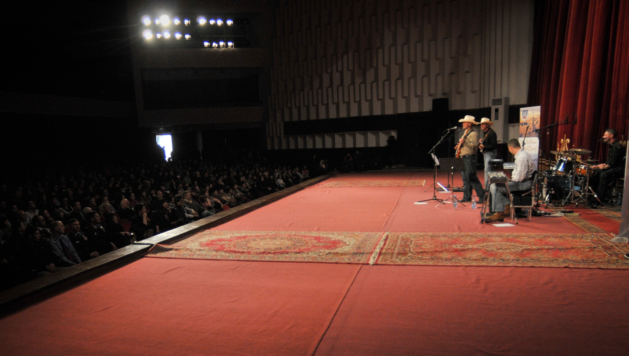TRANSIT CENTER AT MANAS, Kyrgyzstan -  AFCENT band "Wild Blue Country" performs for the local community at the National Philharmonic, here April 5.  The performance packed a full house of 1200 seats making that the largest performance any AFCENT band has ever played here. (U.S. Air Force photo/Staff Sgt. Stacy Moless)
