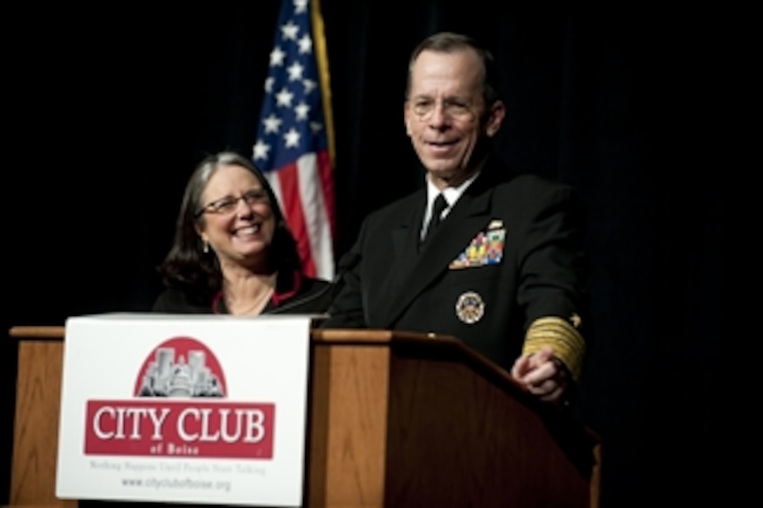 Marcia Franklin, founder of the City Club of Boise and Chairman of the Joint Chiefs of Staff Adm. Mike Mullen deliver remarks at Boise State University in Boise, Idaho, on April 4, 2011.  Mullen and his wife Deborah are in Idaho on their latest stop of "Conversation with the Country," an ongoing tour.  DoD photo by Petty Officer 1st Class Chad J. McNeeley, U.S. Navy.  (Released)