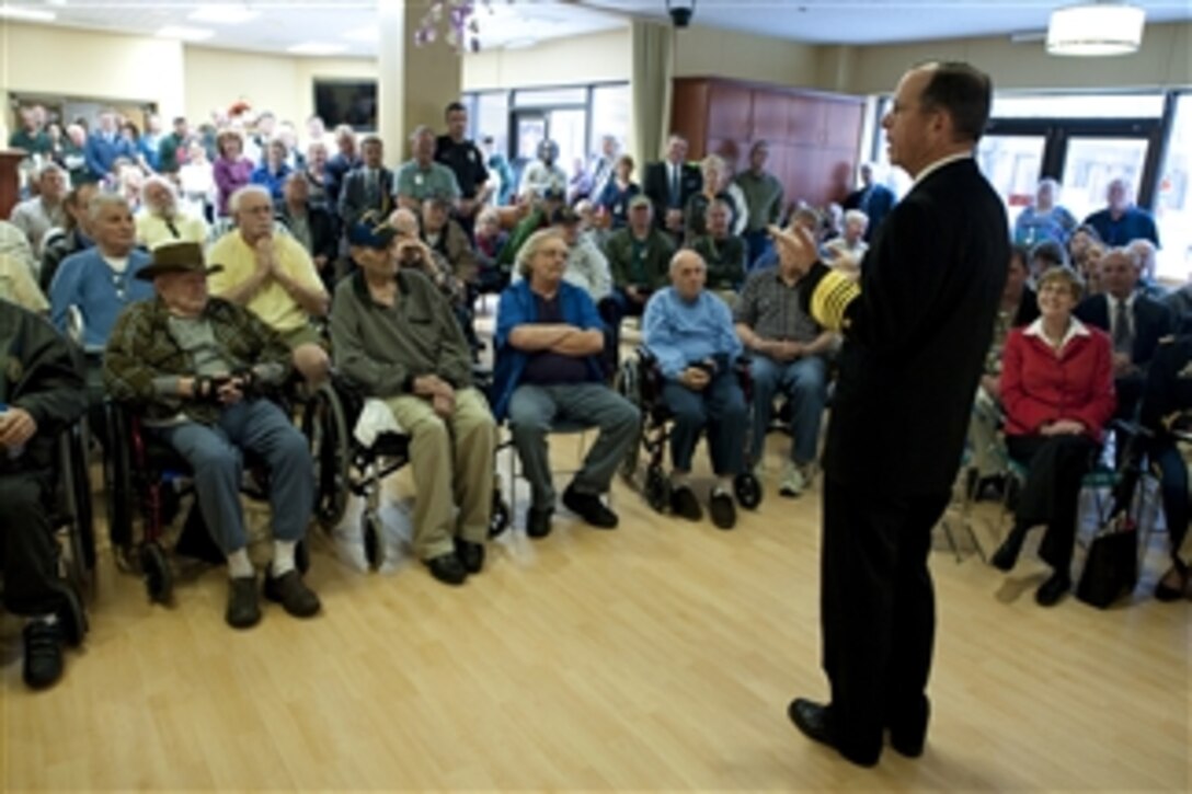 Chairman of the Joint Chiefs of Staff Adm. Mike Mullen, U.S. Navy, answers questions during a town hall meeting at the Veterans Administration in Boise, Idaho, on April 4, 2011.  Mullen and his wife Deborah are in Idaho on their latest stop of "Conversation with the Country," an ongoing tour.  
