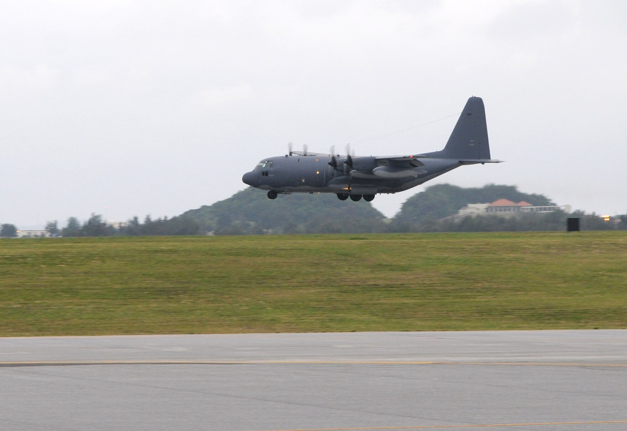 KADENA AIR BASE, Japan -- A MC-130P Combat Shadow from the 17th Special Operations Squadron lands  here April 4. Three aircraft and about 100 Airmen from the 353rd Special Operations Group and 718th Aircraft Maintenance Squadron returned here April 4 as  Airmen repositioned here after supporting Operation Tomodachi from Yokota Air Base for nearly three weeks. (U.S. Air Force photo by Tech. Sgt. Aaron Cram)  