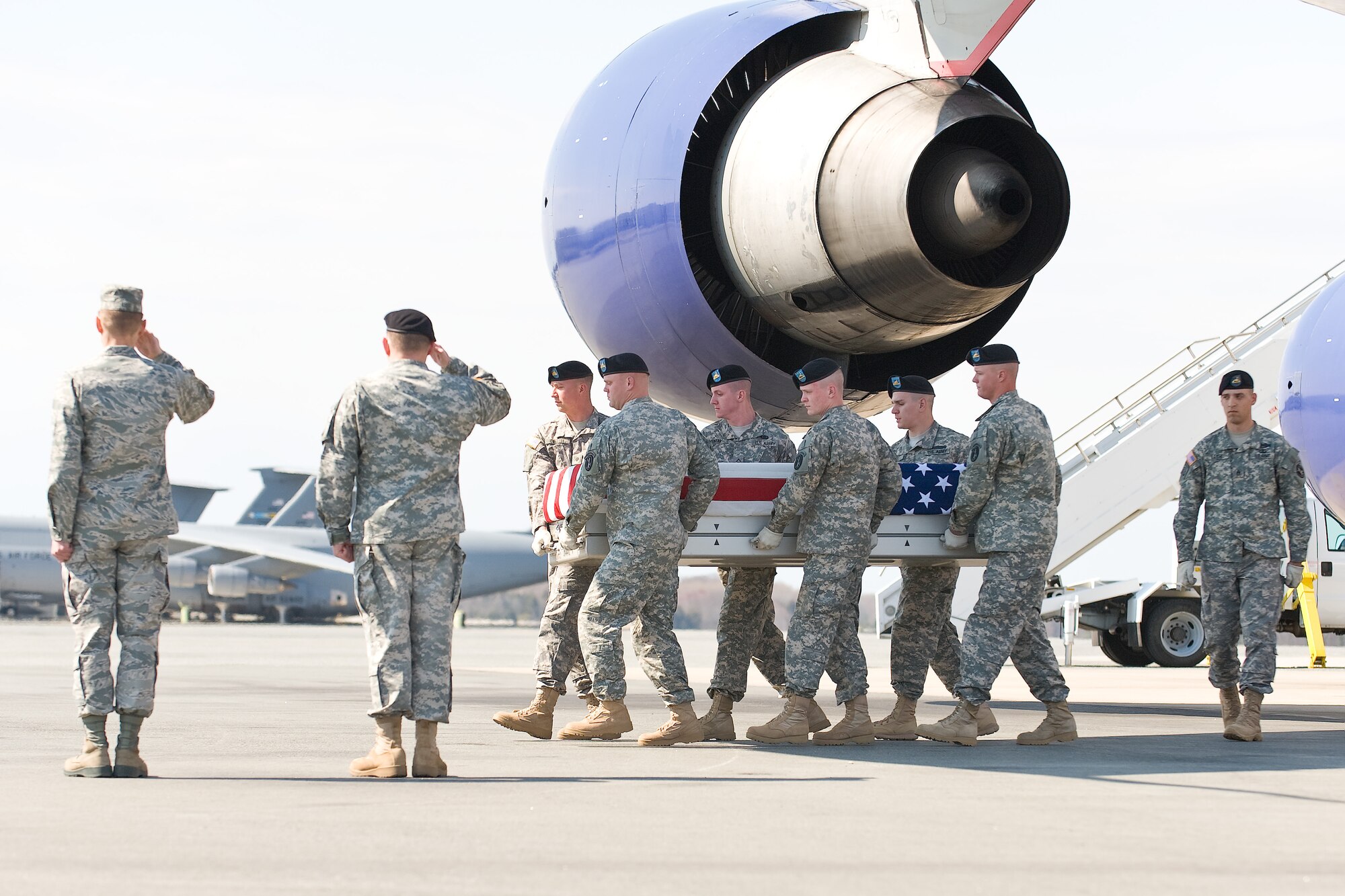 A U.S. Army carry team transfers the remains of Army Sgt. Michael S. Lammerts, of Tonawanda, N.Y., at Dover Air Force Base, Del., April 6, 2011. Lammerts was assigned to the 1st Battalion, 84th Field Artillery Regiment, 170th Infantry Brigade Combat Team, Baumholder, Germany. (U.S. Air Force photo/Roland Balik)