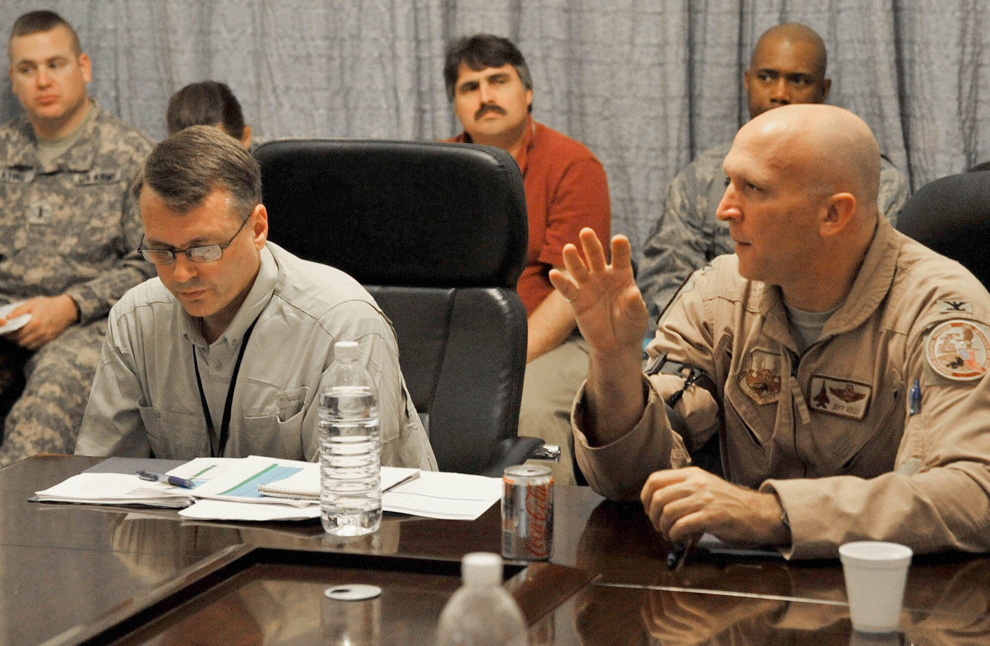 Col. Jeffrey Kelly, from U.S. Air Forces Central, discusses a manpower issue directly with a roomful of U.S. Army and Air Force leaders, March 22, 2011, at Victory Base Complex, Iraq. USAFCENT officials plan to hold a similar conference each quarter. (U.S. Air Force photo/Senior Airman Andrew Lee)
