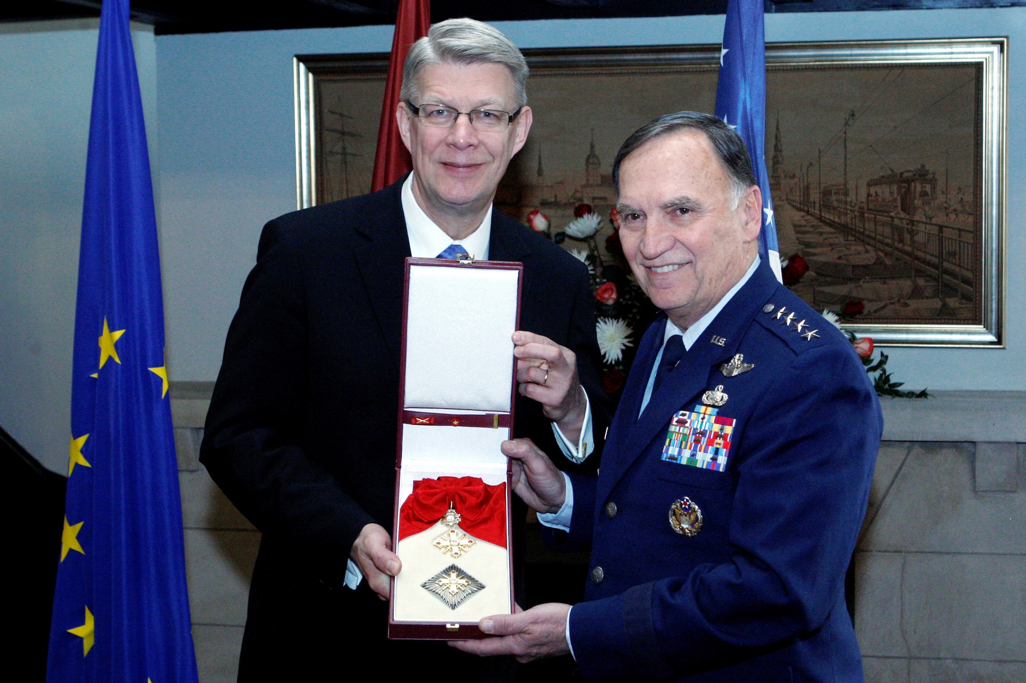 Latvian President Valdis Zatlers awards retired Gen. William Tom Hobbins the Order of Viesturs, First Grade, April 1, 2011, in Washington, D.C., in recognition of the general's investment in helping to ensure the success of the NATO summit in Riga, Latvia, in November 2006. General Hobbins was the U.S. Air Forces in Europe commander from 2005 to 2008. (Courtesy photo/Toms Kalnins)