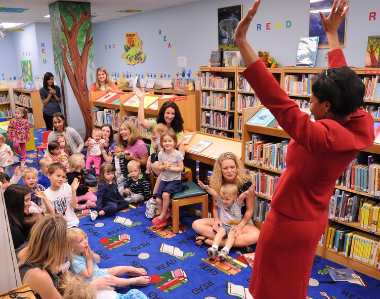 LAUGHLIN AIR FORCE BASE, Texas – Machelle Terrell, 47th Flying Training Wing sexual assault response coordinator, entertains some Laughlin youth and their mothers, who gathered at Laughlin’s Bookmark Library April 1 to witness the signing of a proclamation declaring April as Child Abuse Prevention Month here. (U.S. Air Force photo by Airman 1st Class Blake Mize)  