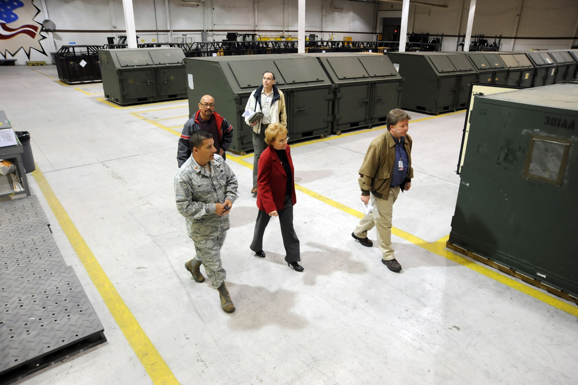 A pre-inspection team walks through Building 1090 before a practice inspection during the Chemical Weapons Convention Mock Challenge Inspection March 30, 2011, McConnell Air Force Base, Kan. The pre-inspection team prepared the facility’s personnel for a possible encounter with inspectors who search for violations of the CWC treaty. (U.S. Air Force photo/Staff Sgt. Dallas Edwards)