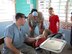 Major Vincent Chiappone and Major Michael Daily, dentists with the 940th Aerospace Medicine Squadron, Beale Air Force Base, Calif., see patients at a clinic in a remote village in Belize, Apr 1.  The two Reservists are members of a 42-person team of U.S. Air Force medical professionals who are in Belize for the 2011 Medical Readiness Training Exercise.  The annual exercise brings humanitarian care and free medical assistance to citizens of the host country. (Courtesy Photo)