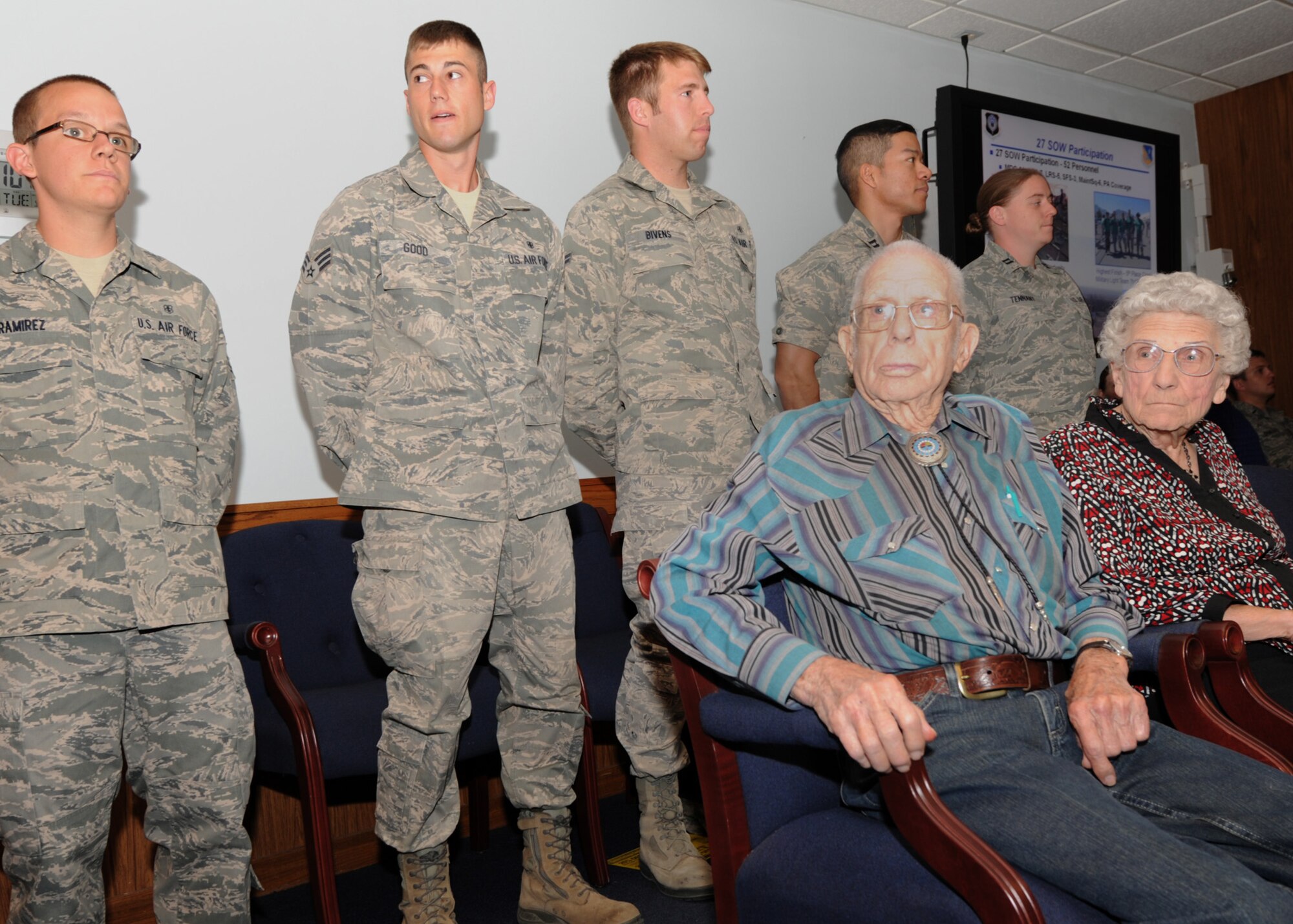 (Standing in the back row from left to right)U.S. Air Force Airman 1st Class Nicholas Ramirez, 27th Special Operations Medical Group, Senior Airman Richard Good, 27th SOMDG, A1C Drew Bivens, 27th SOW MDG, Captain Frederick Aban, 27th SOW MDG and Capt. Melissa Tennant, 27th SOW MDG (front) Buren and Lucille Johnson are recognized for the 22nd Annual Bataan Death March that occurred March 27, 2011 on White Sands Missile Range.  Out of 20 teams completed, this five man team completed placed fifth with a time of seven hours and twelve minutes.  The 27th SOW MDG had 30 members in attendance with four teams of five people that completed the 26.2 mile event.  (U.S. Air Force photo by Senior Airman James Bell)