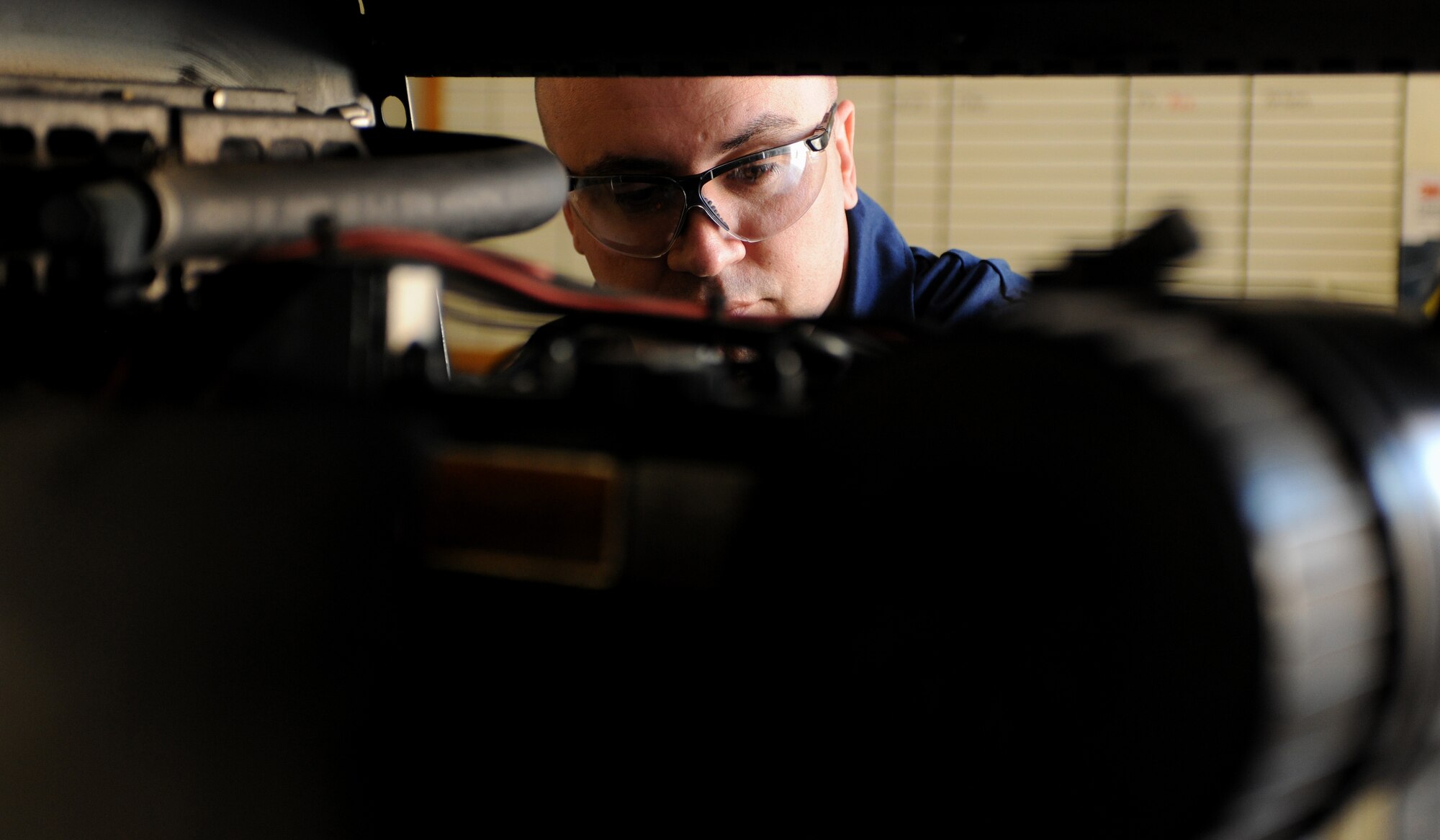 Tech. Sgt. Casey Luedke, 23rd Equipment Maintenance Squadron aerospace ground equipment assistant NCO in charge, corrects a wiring flaw while performing routine maintenance to several pieces of ground equipment at the AGE compound at Moody Air Force Base, Ga., April 5. During his initial inspection, Sergeant Luedke noticed a faulty wire on the fuel solenoid.  (U.S. Air Force photo/Airman 1st Class Benjamin Wiseman)(RELEASED)