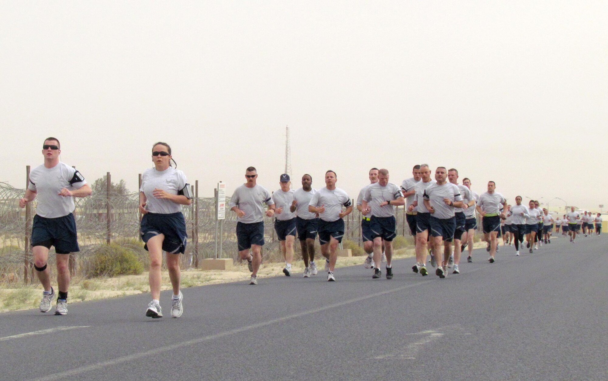 More than 100 members of the 386th Air Expeditionary Wing participated in the Rock Chapel's Physically Fit, Spiritually Strong 5k run April 2, at an undisclosed location in Southwest Asia. (U.S. Air Force photo by Tech. Sgt. Sandra Bradley)                                       